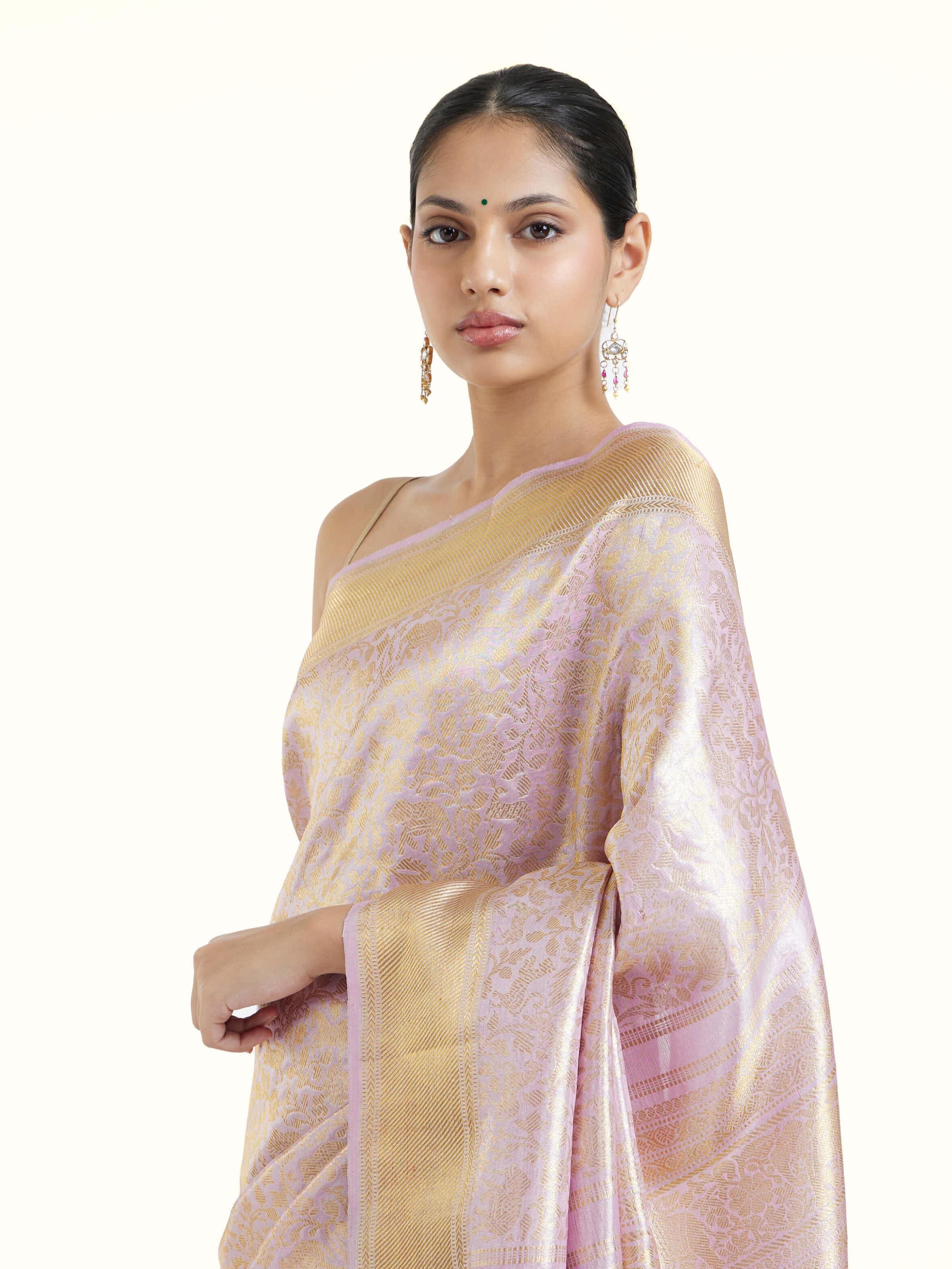 Angled view of lavender silk Kancheepuram saree highlighting traditional weave