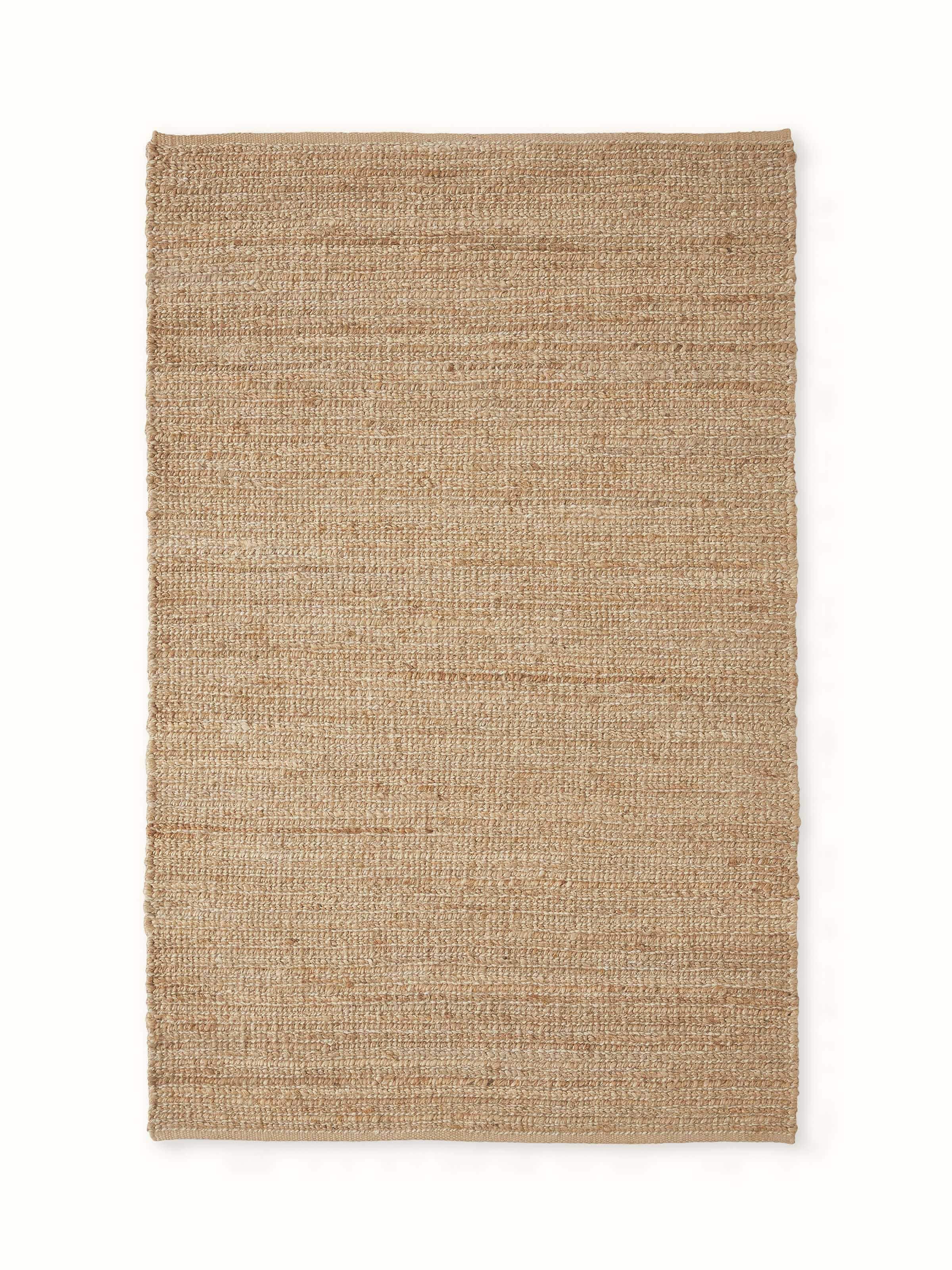 Front view showing the full 4x6 ft solid textured beige rug made from jute and wool