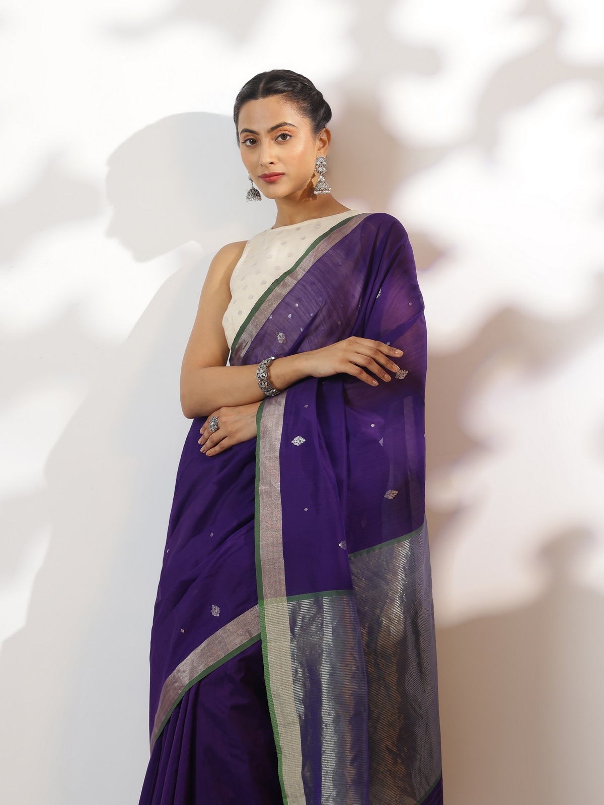 Alternate side view of Anika cotton silk Chanderi saree emphasizing fabric texture