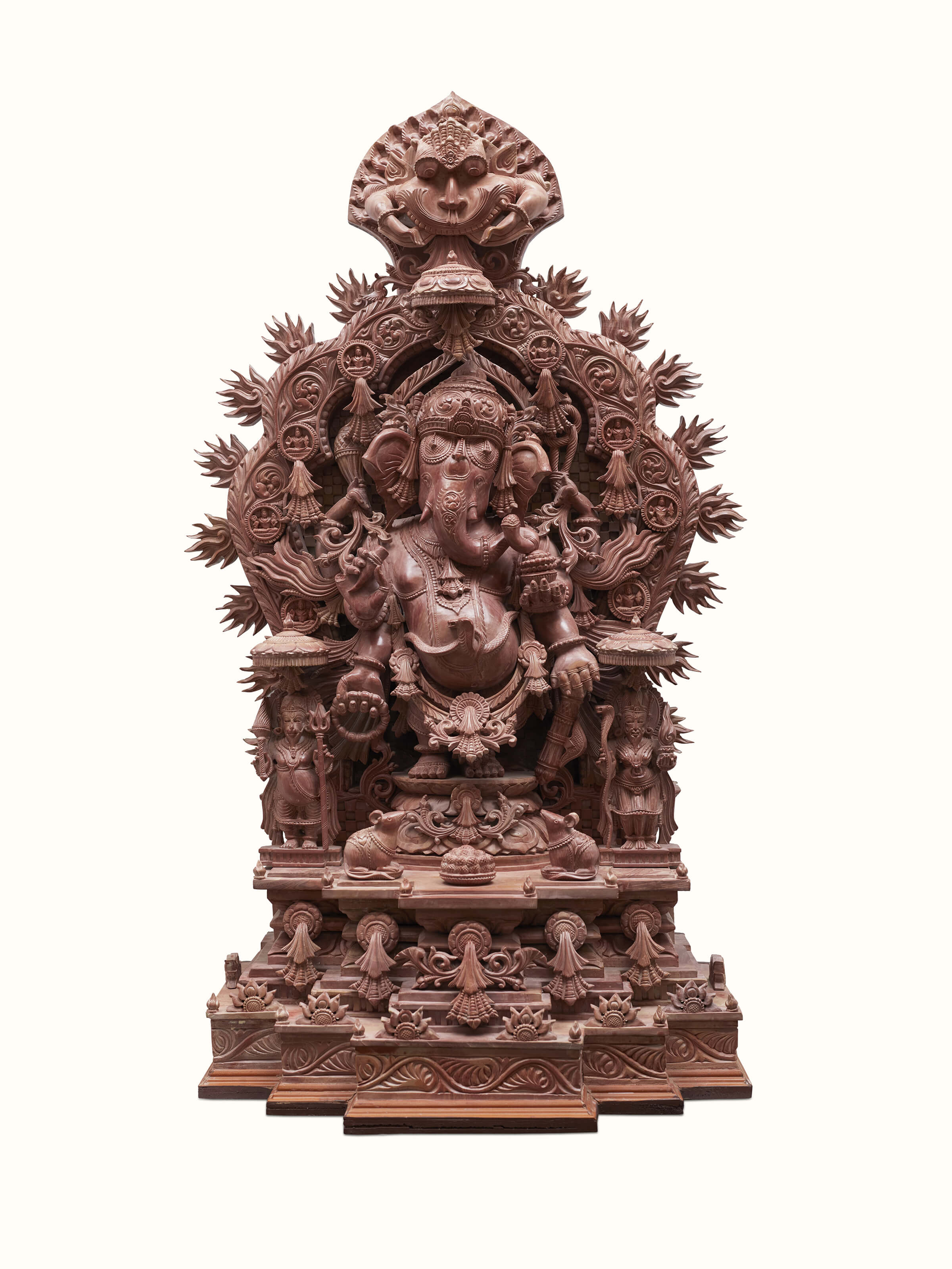 Front view of Stone Ganesha Idol showcasing detailed carvings and a traditional design