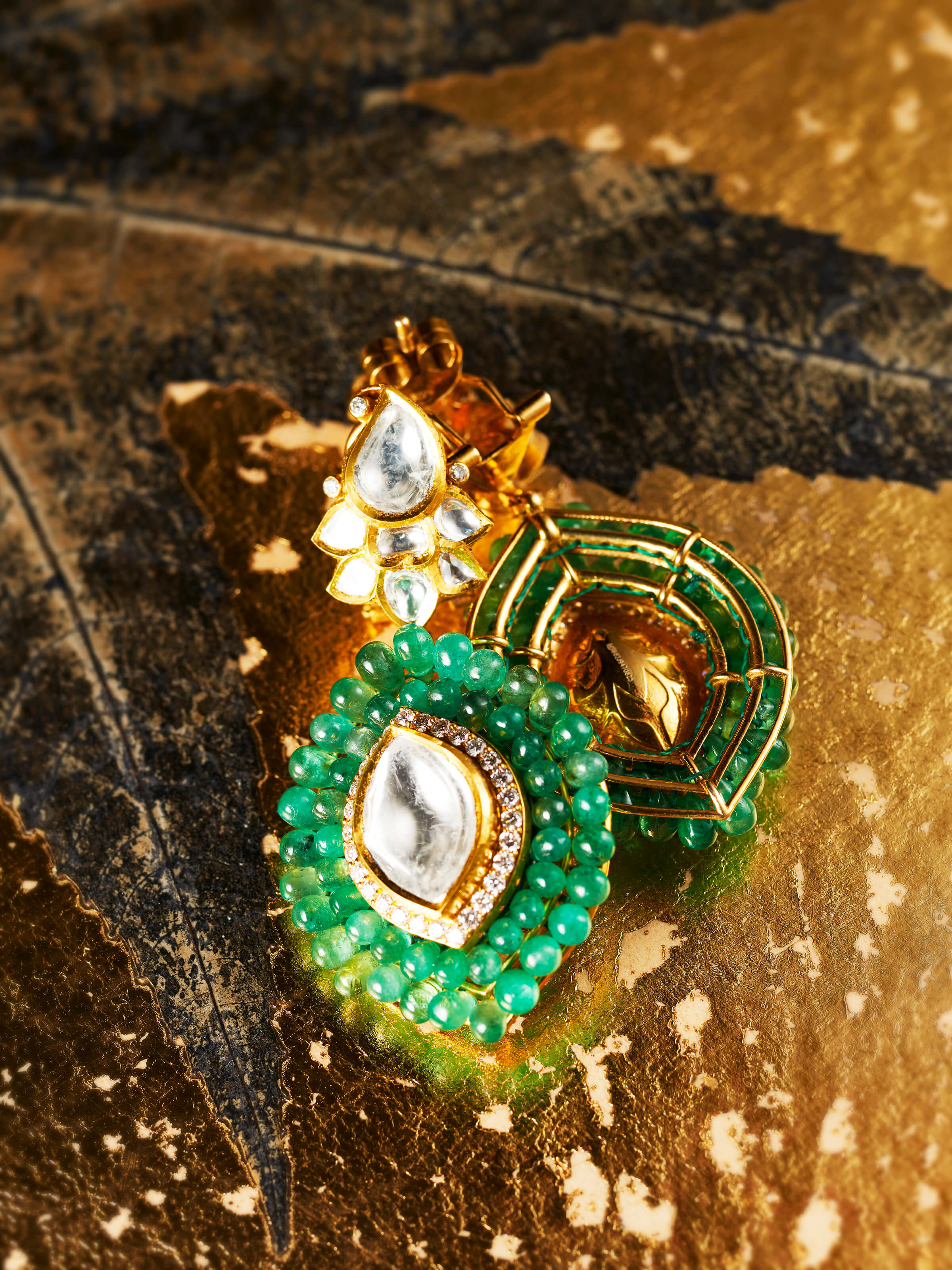 detail view of dank polki 14 karat gold drop earrings design