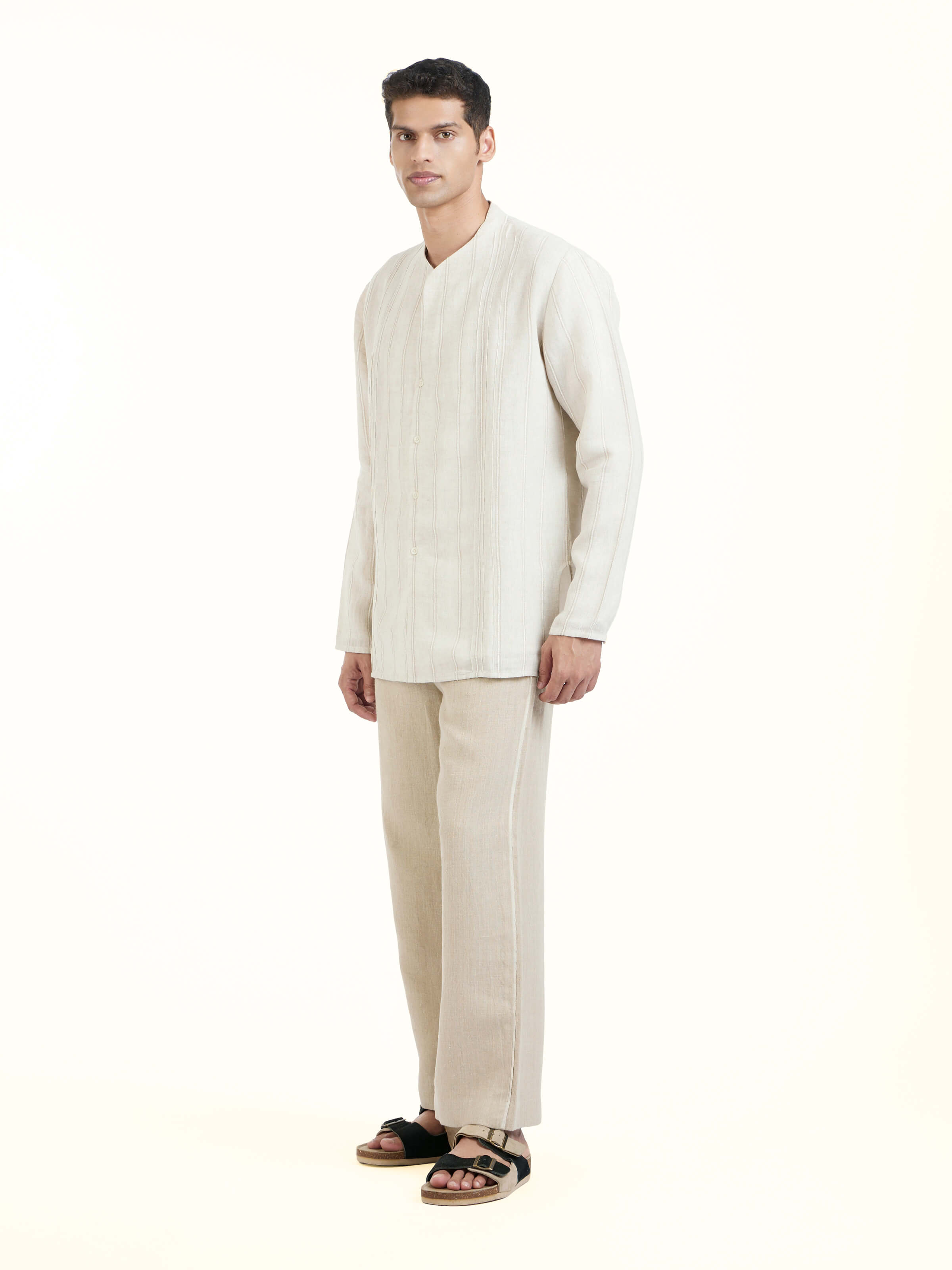 Side view of ivory linen handloom full sleeve shirt highlighting relaxed fit and breathable fabric
