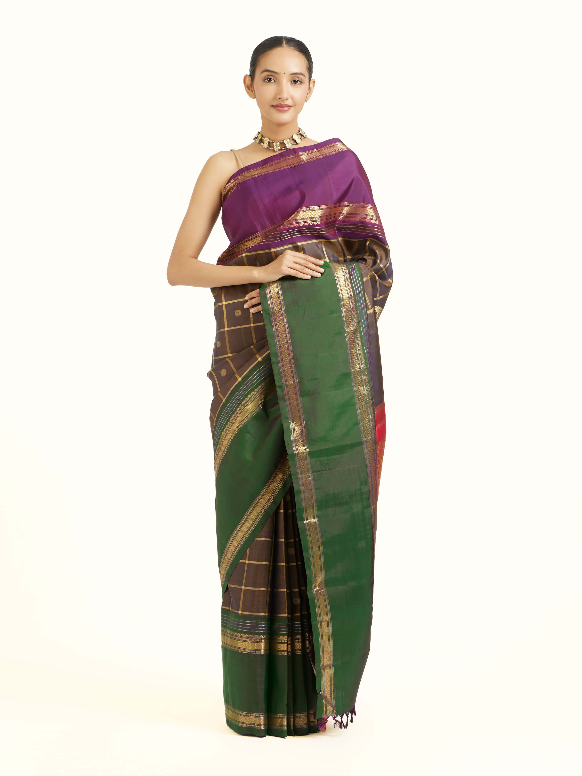 Front view of black silk Kancheepuram saree with rich zari woven motifs