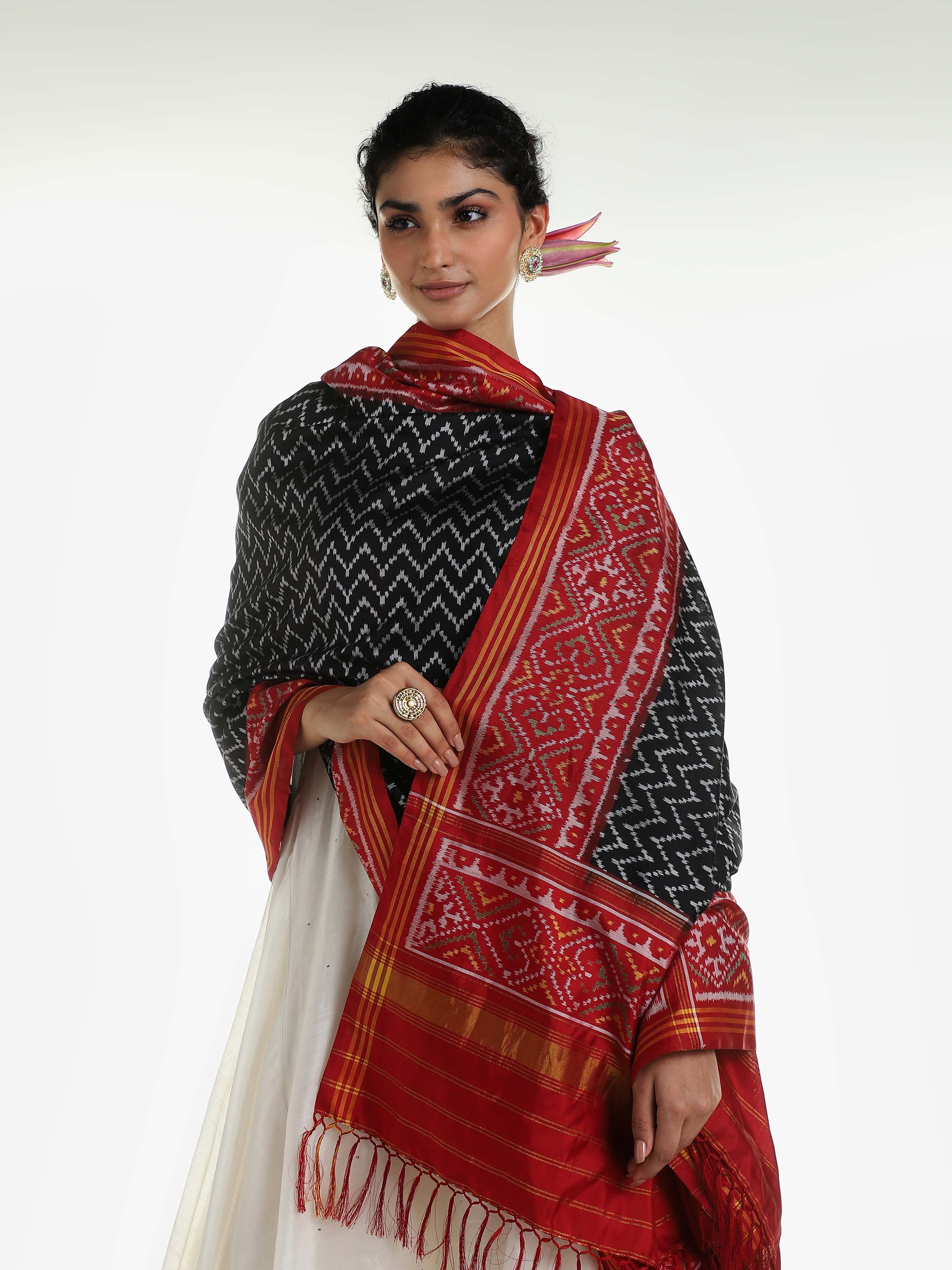 Angled view of black silk Patola dupatta showing full length design