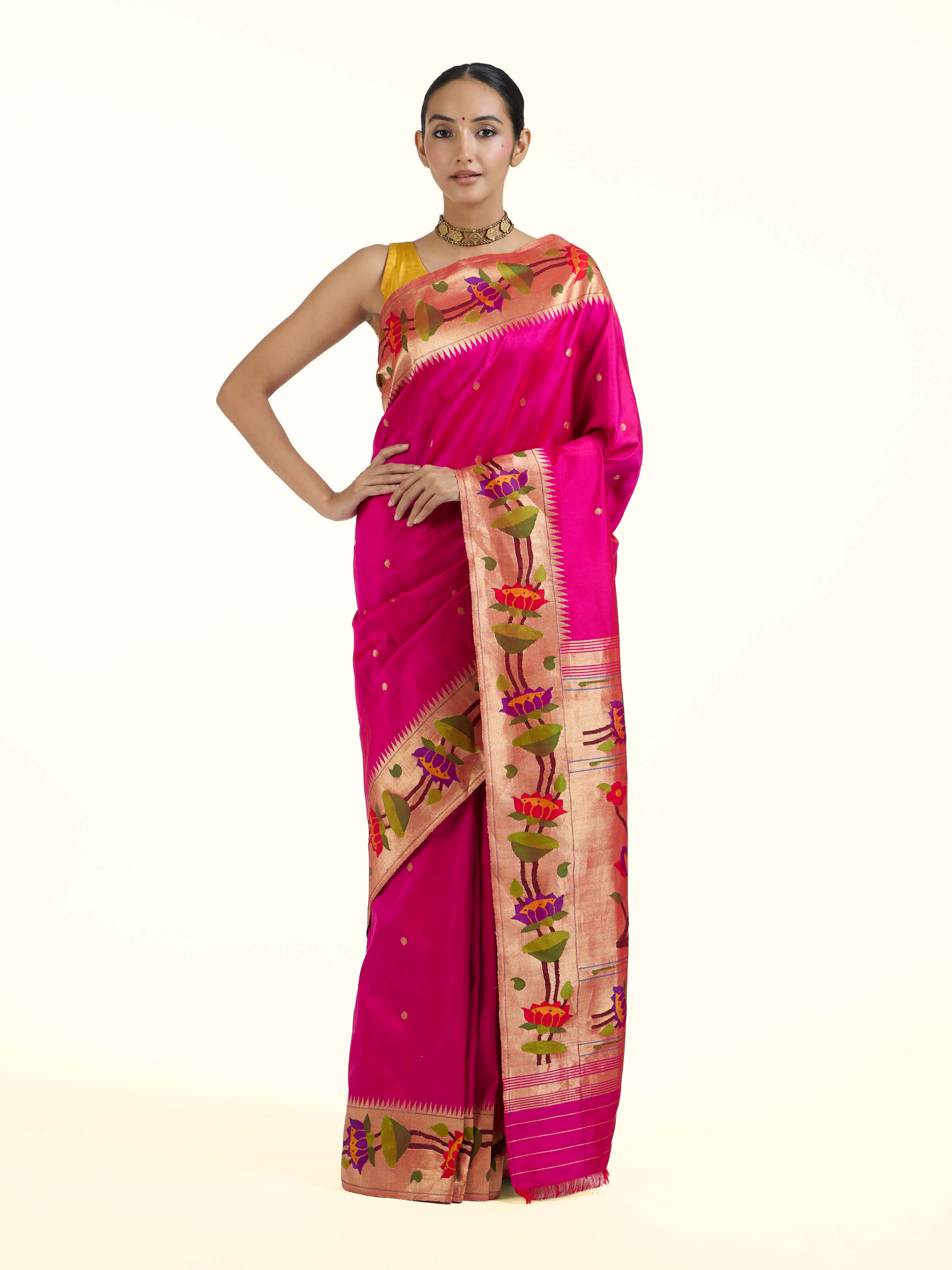Front view of purple silk Paithani saree with traditional zari woven motifs