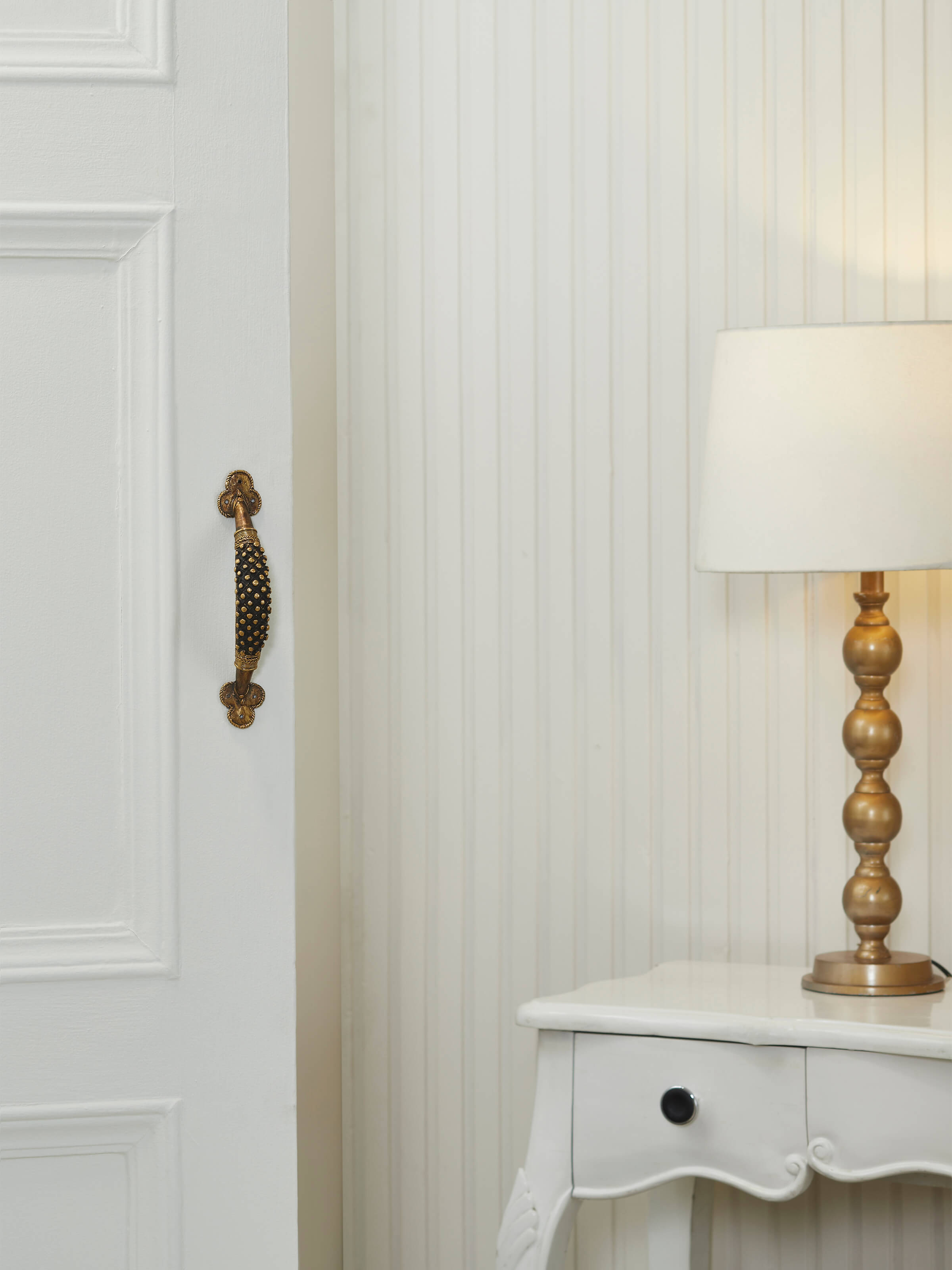 Side view of Dhokra Brass Small Balls Door Handle highlighting the texture and craftsmanship of the small brass balls