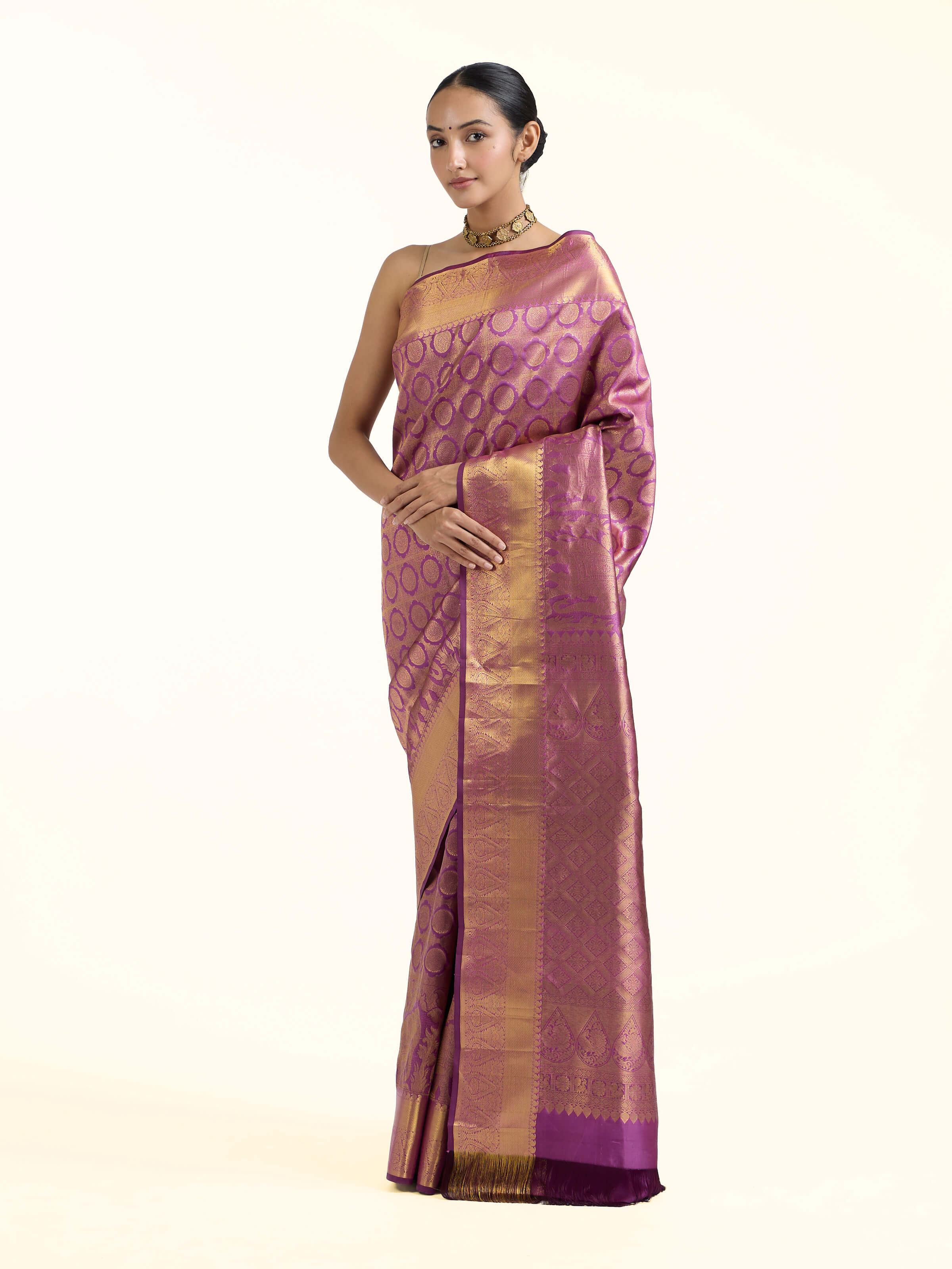 Side view of purple silk Kancheepuram saree showcasing silk sheen
