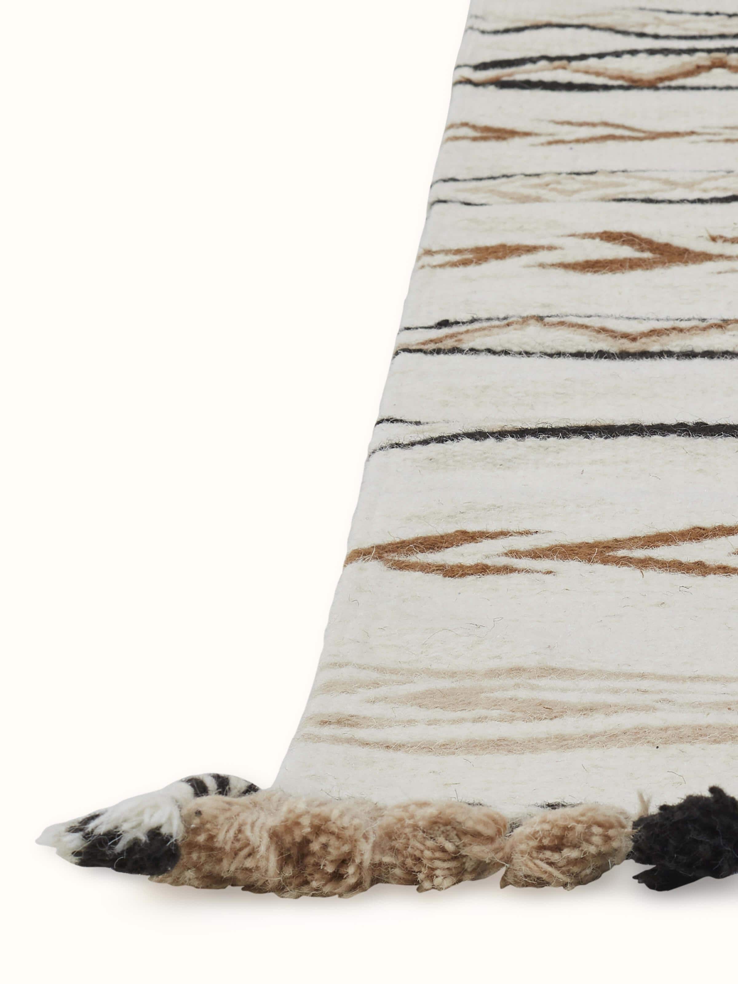 Angled view: Angled view of runner showing linear pattern and handwoven texture.