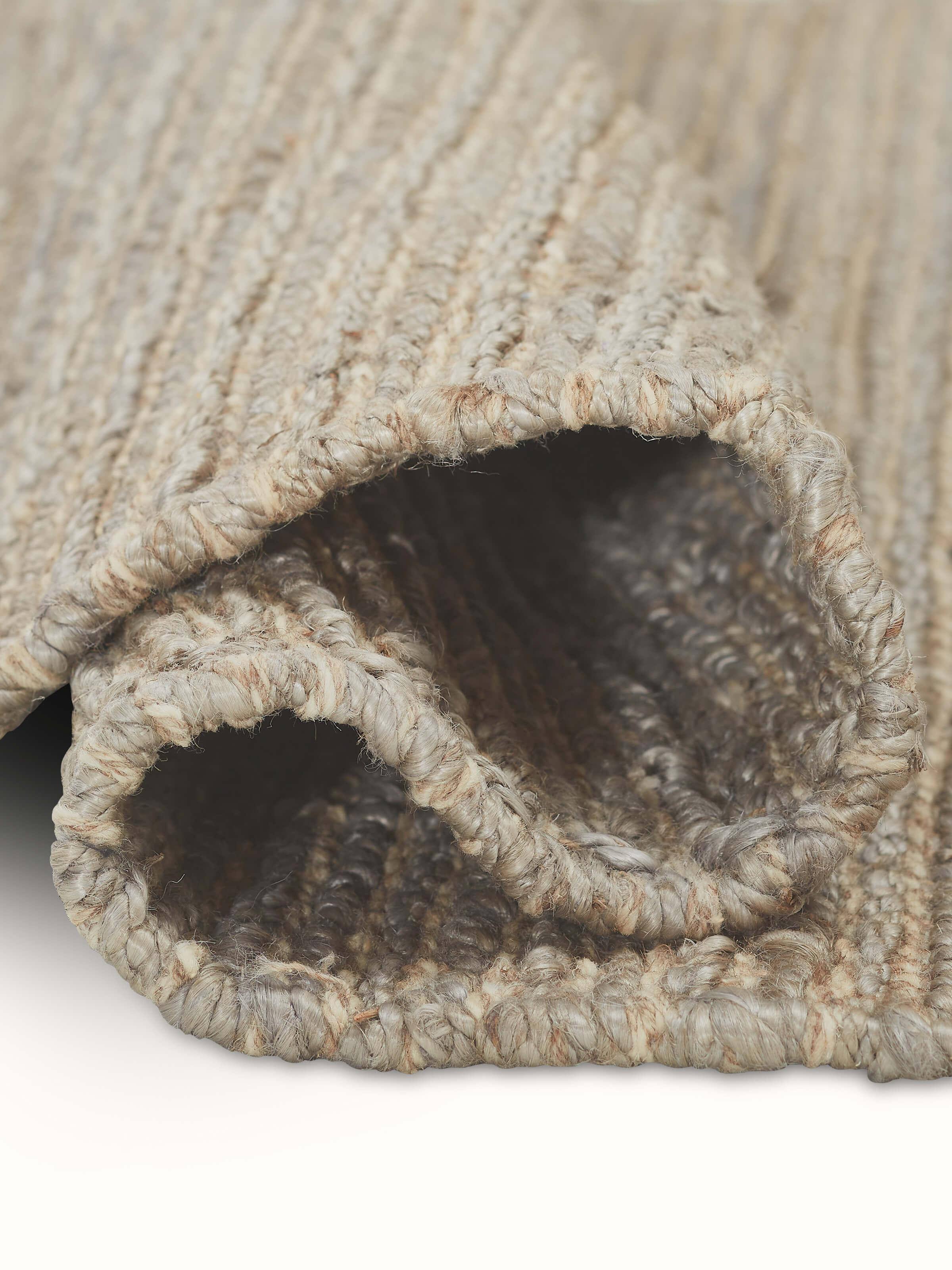 Detailed texture shot of Solid Grey Jute & Wool Rug emphasizing the blend of natural fibers