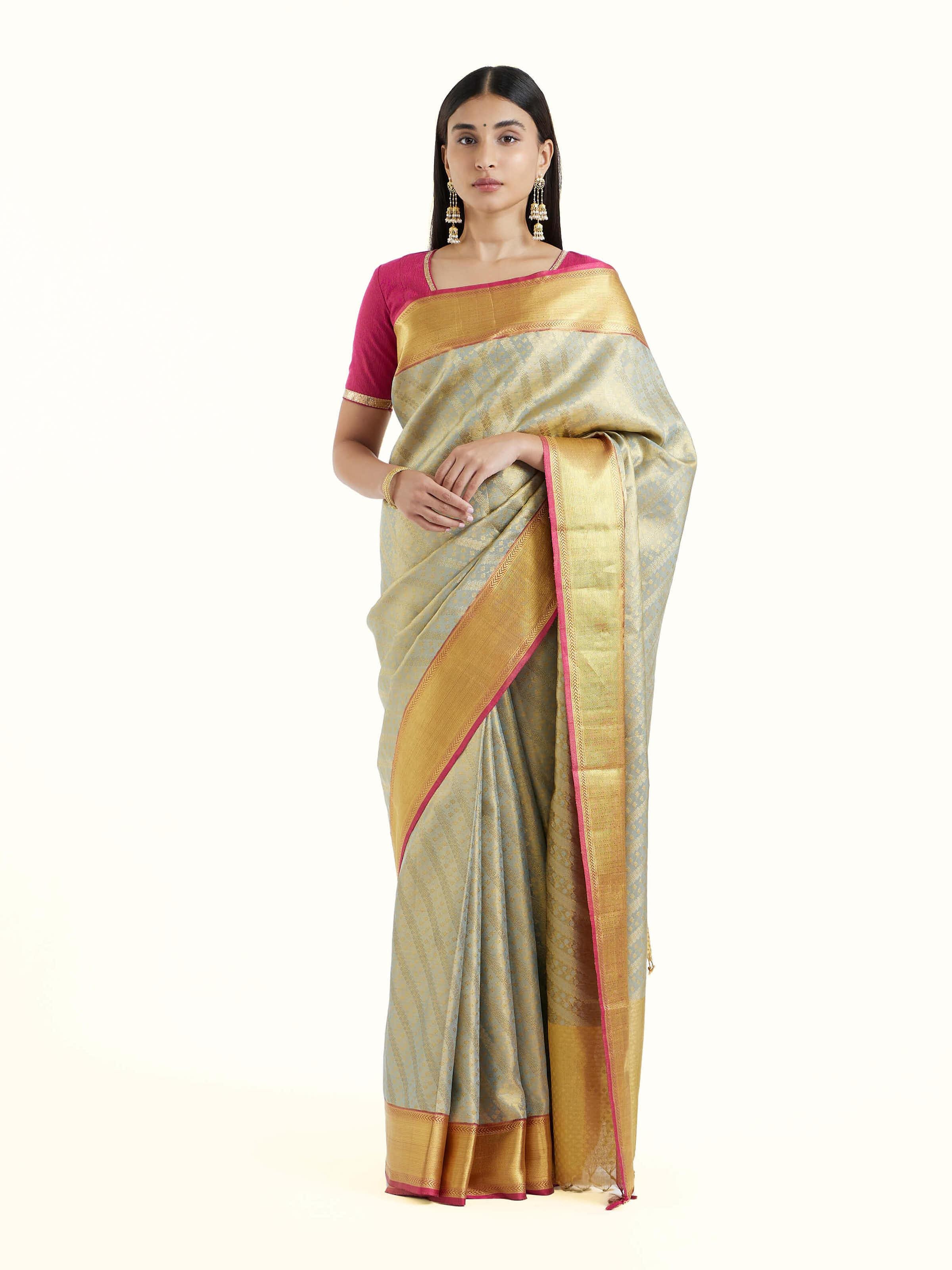 Front view of pista silk Kancheepuram saree with rich zari border
