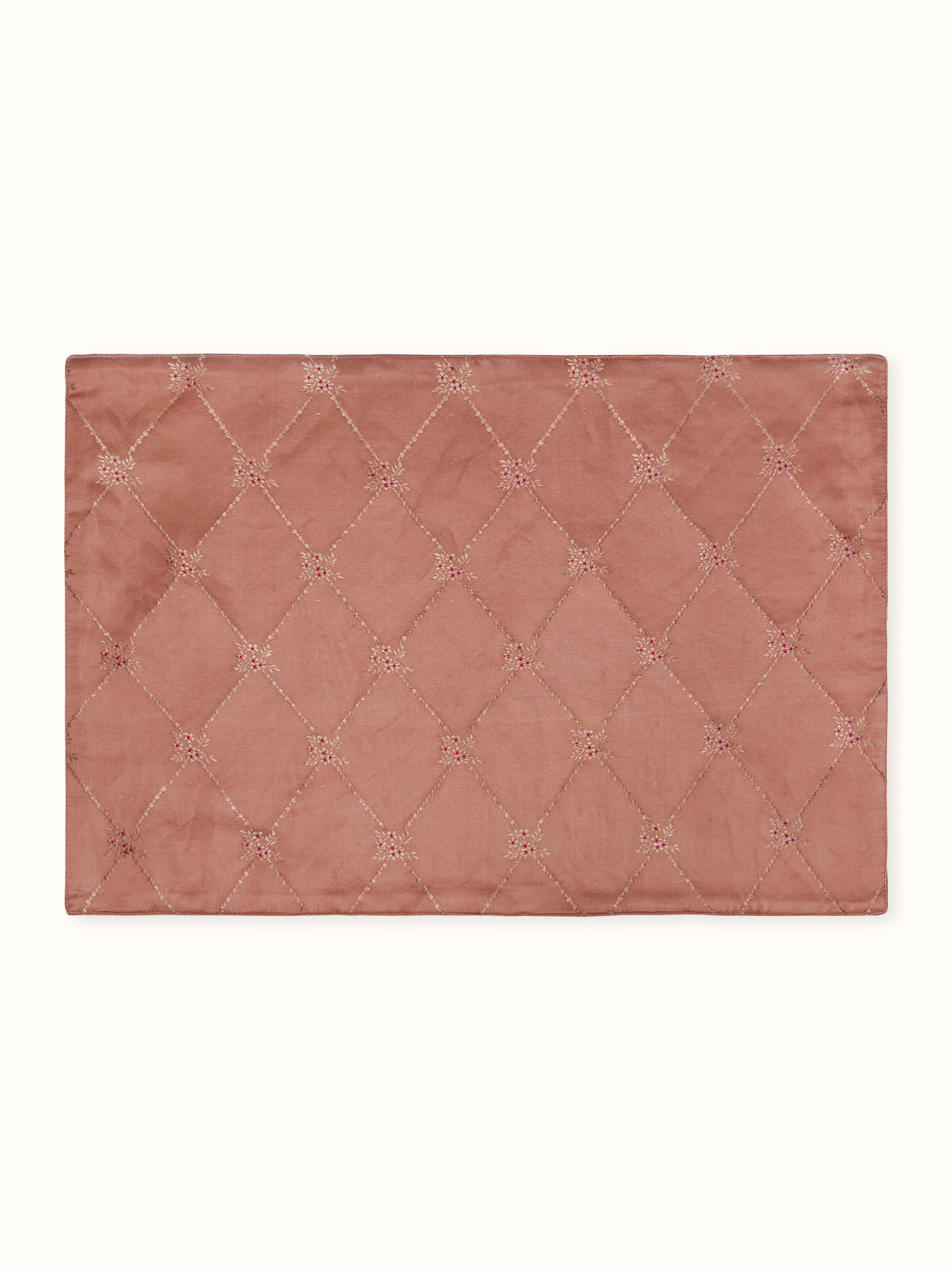 Top view of six peach Banarasi brocade handloom table mats with elegant trellis weave.