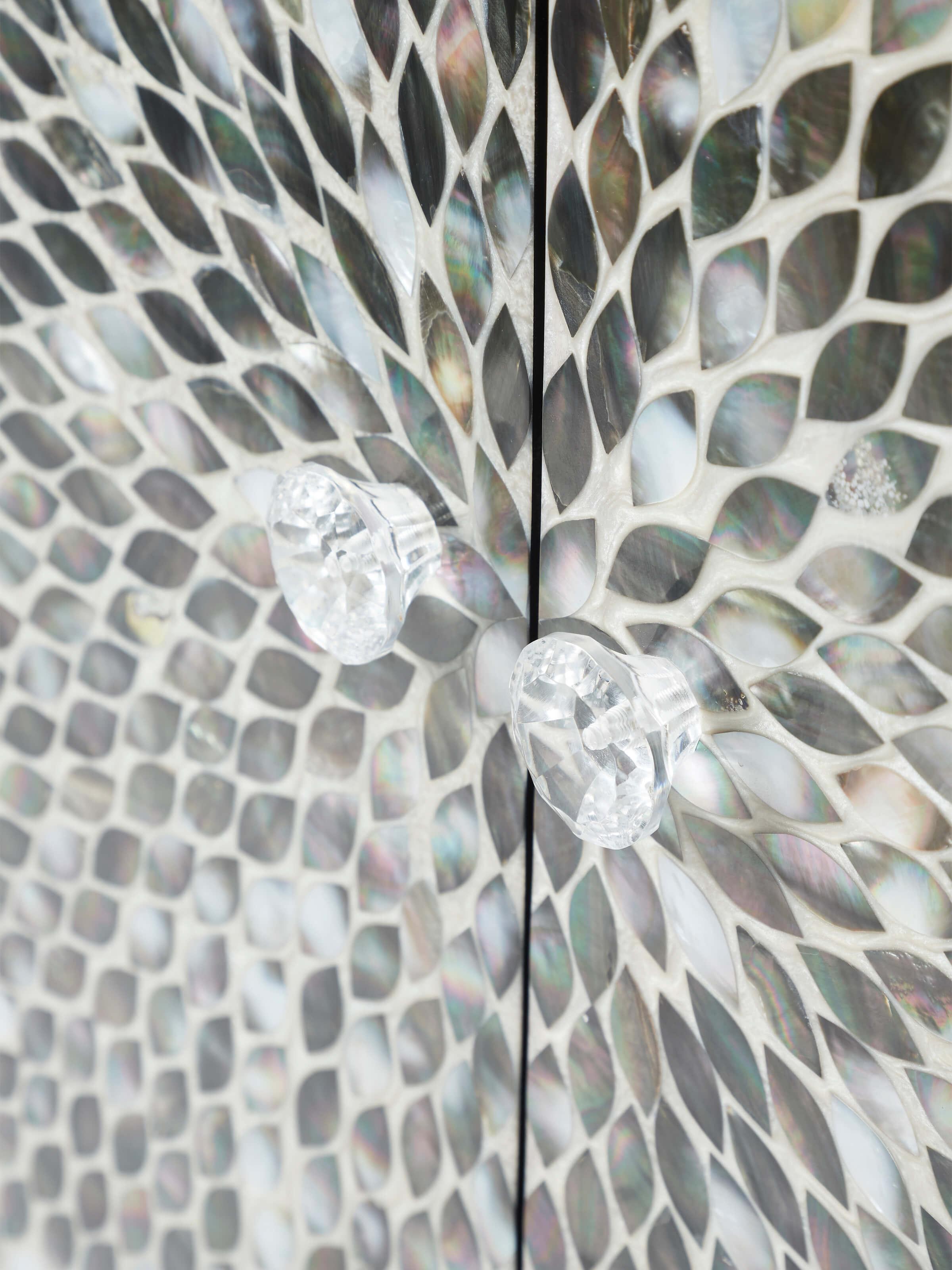 Close-up of the mango wood and mother-of-pearl inlay on the bar cabinet, focusing on the quality of materials and craftsmanship