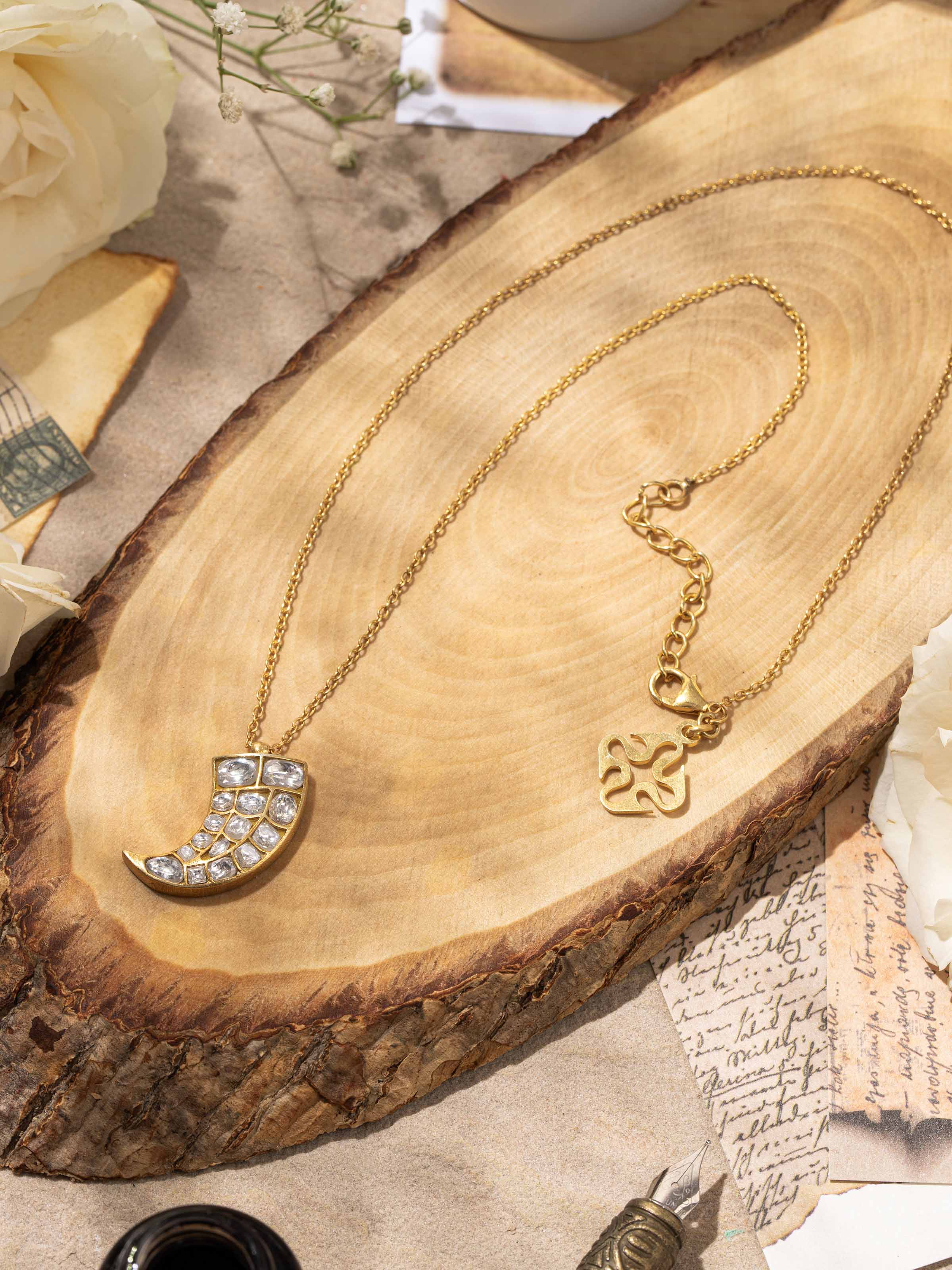 Alternate lifestyle angle to emphasize the pendant's refined size and versatile appeal