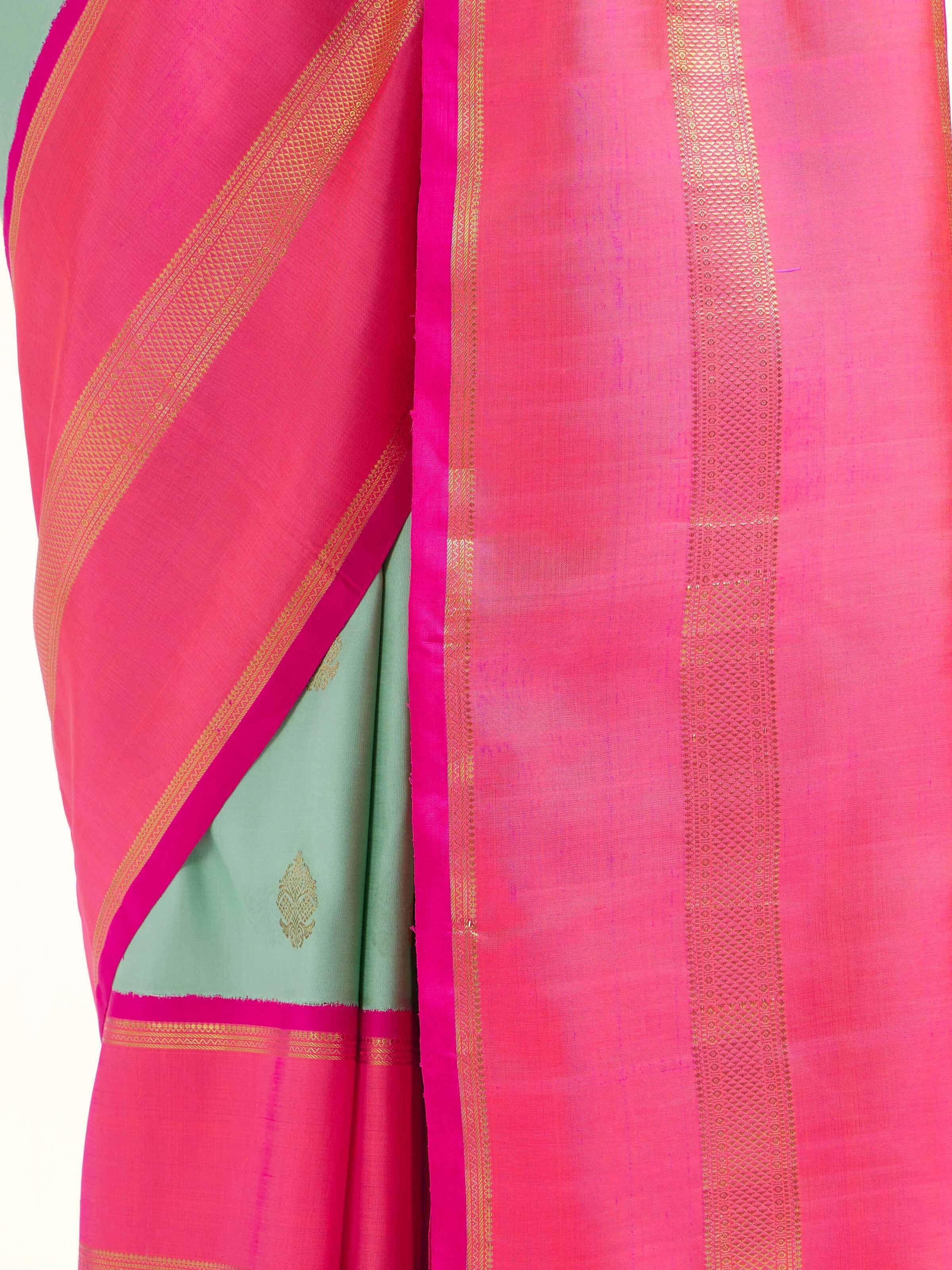 Detail view of light blue silk Kancheepuram saree showing silk texture and zari craftsmanship
