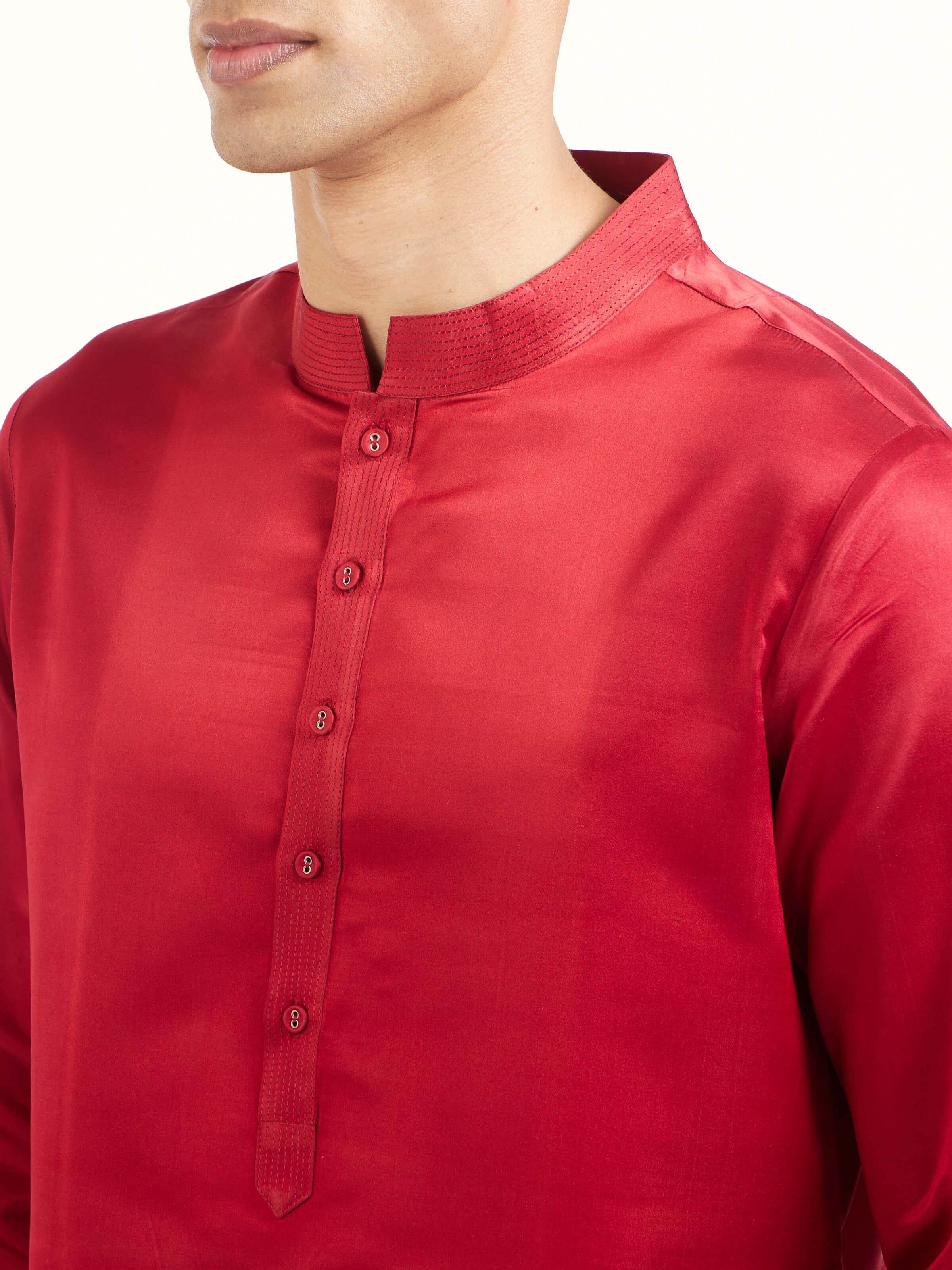 Detail view of maroon katan silk Banarasi long kurta churidar set with fabric texture and weave