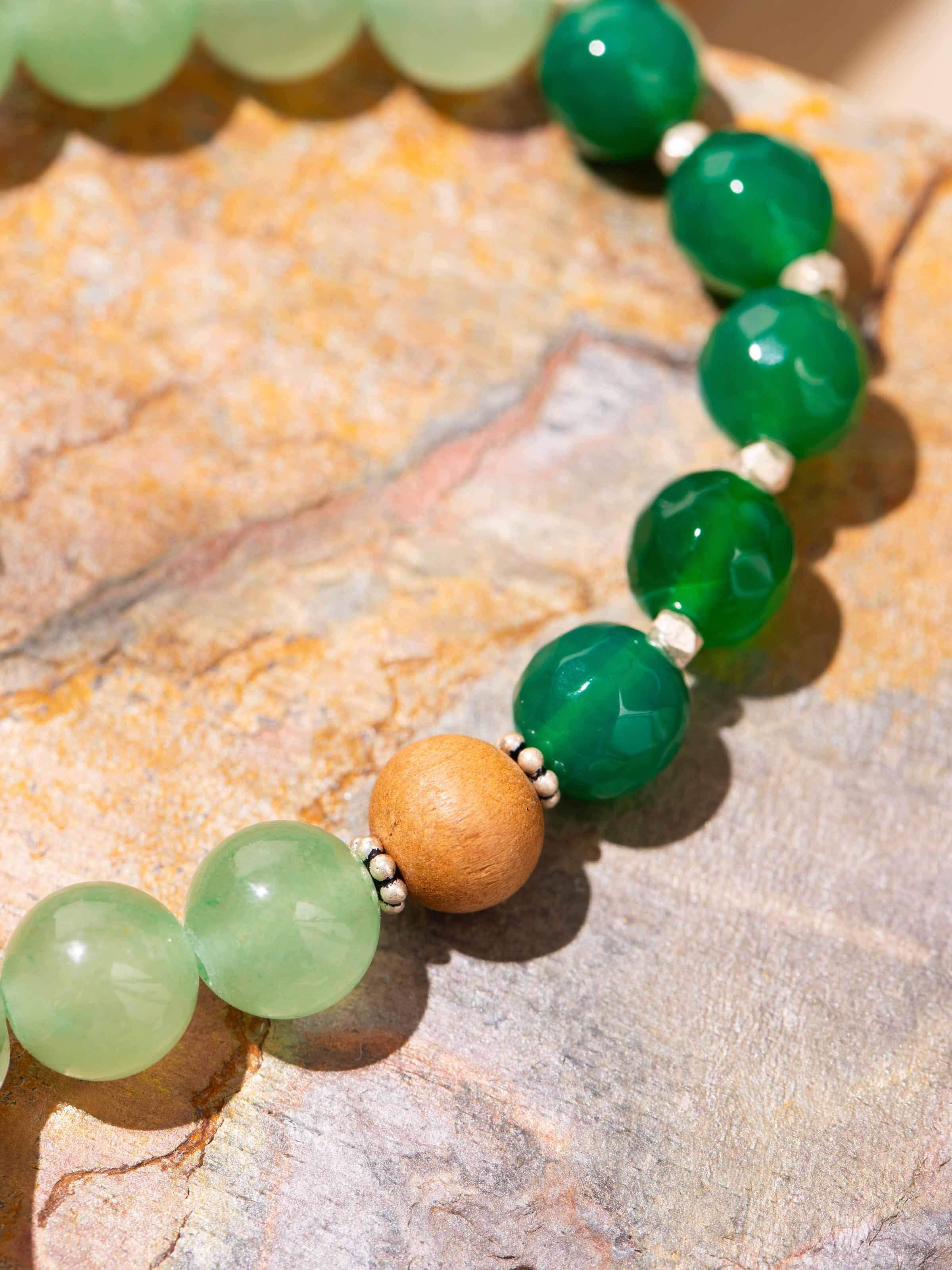 Angled display of Green Aventurine & Onyx Bracelet showing subtle sheen and clean arrangement