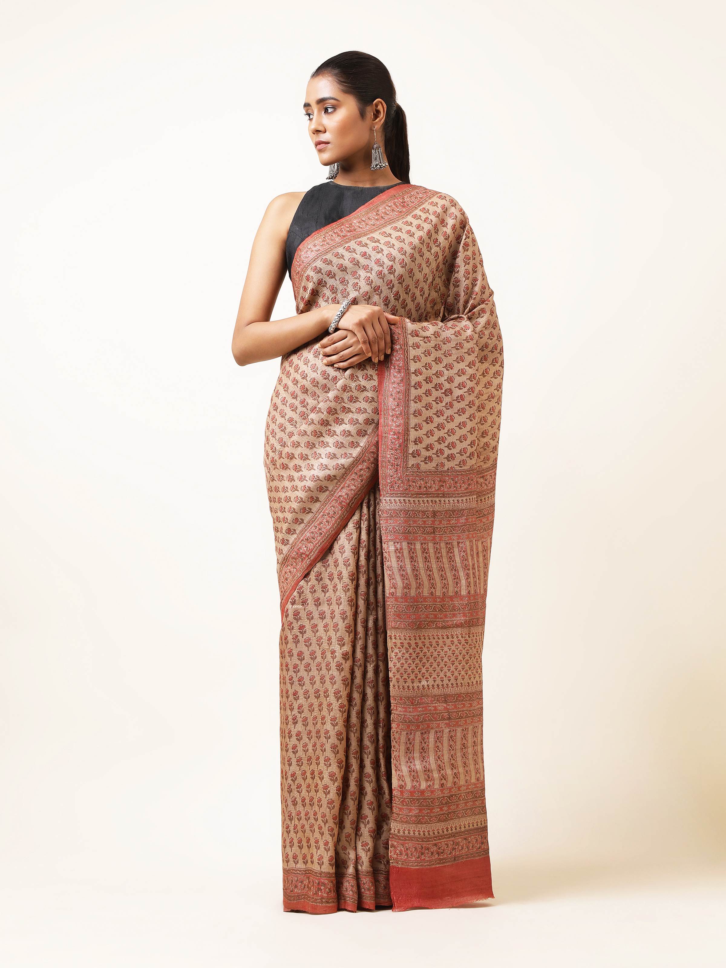 Front view of Red Tussar Muga Silk Bagru Block Printed Saree with vibrant prints