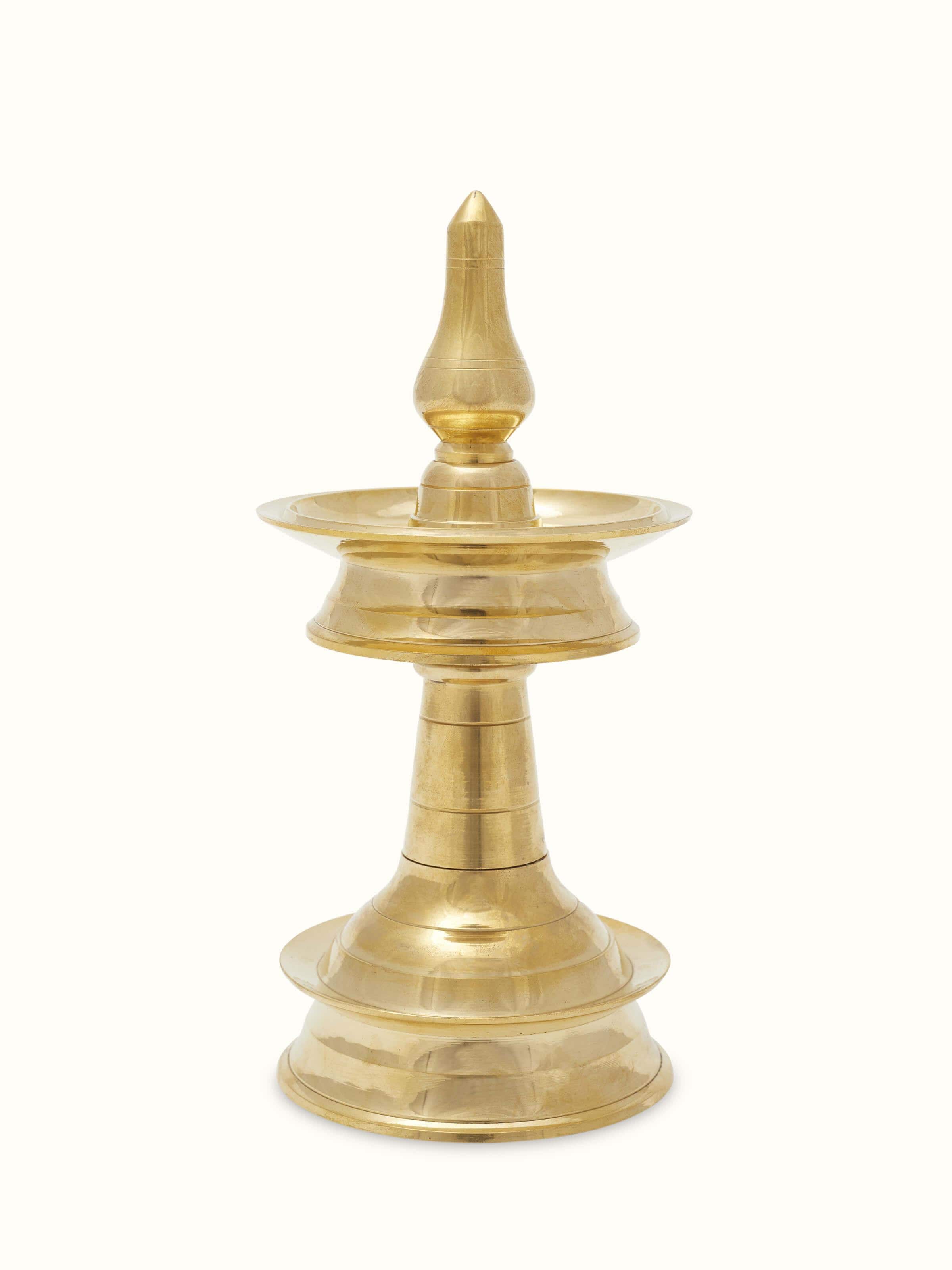 Front view of traditional brass samai vilakku stand diya showcasing elegant design and craftsmanship