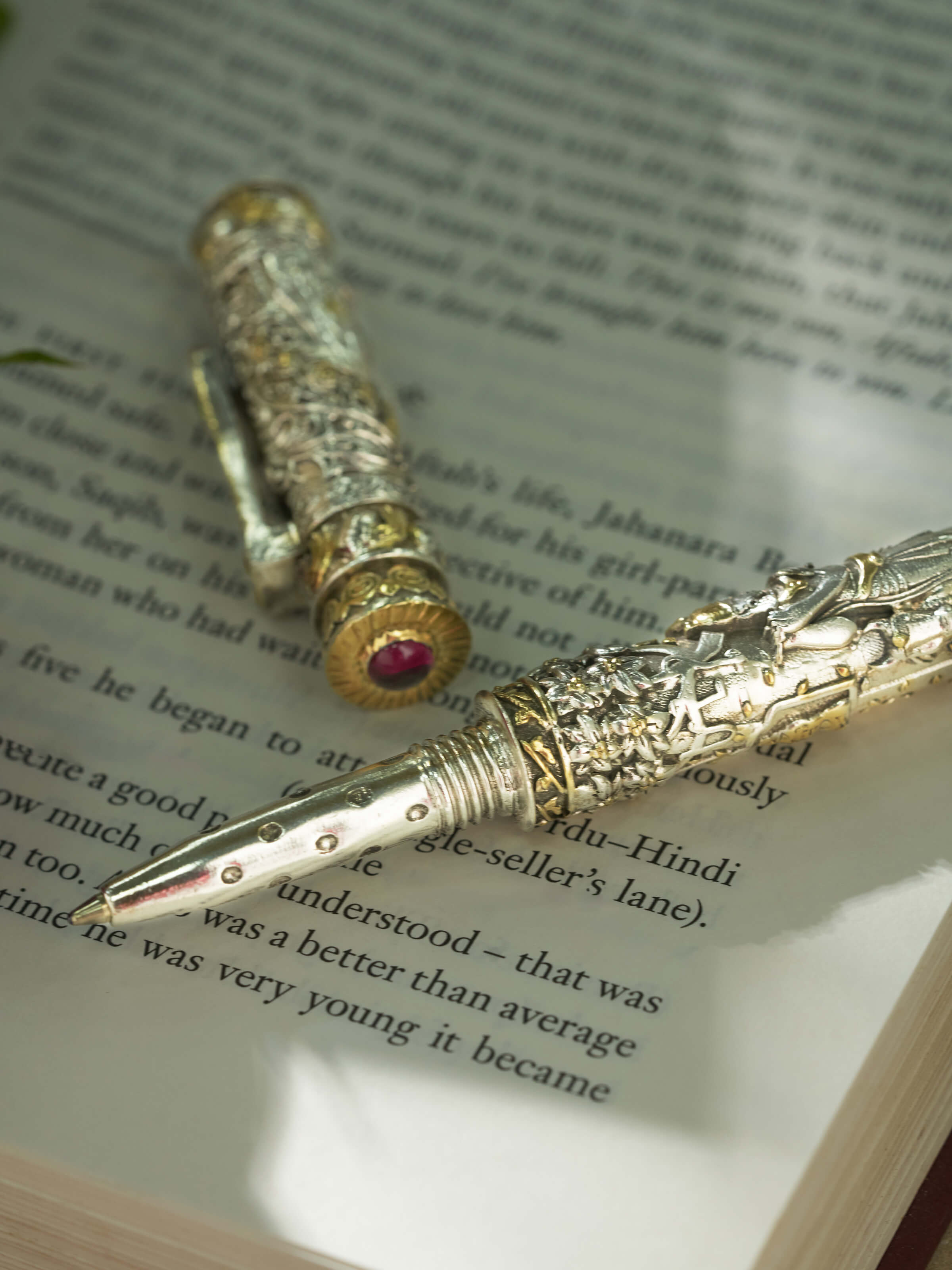 Overhead view of Tribal Silver Collar Necklace by Swadesh emphasizing the sculptural design and gleaming silver shine