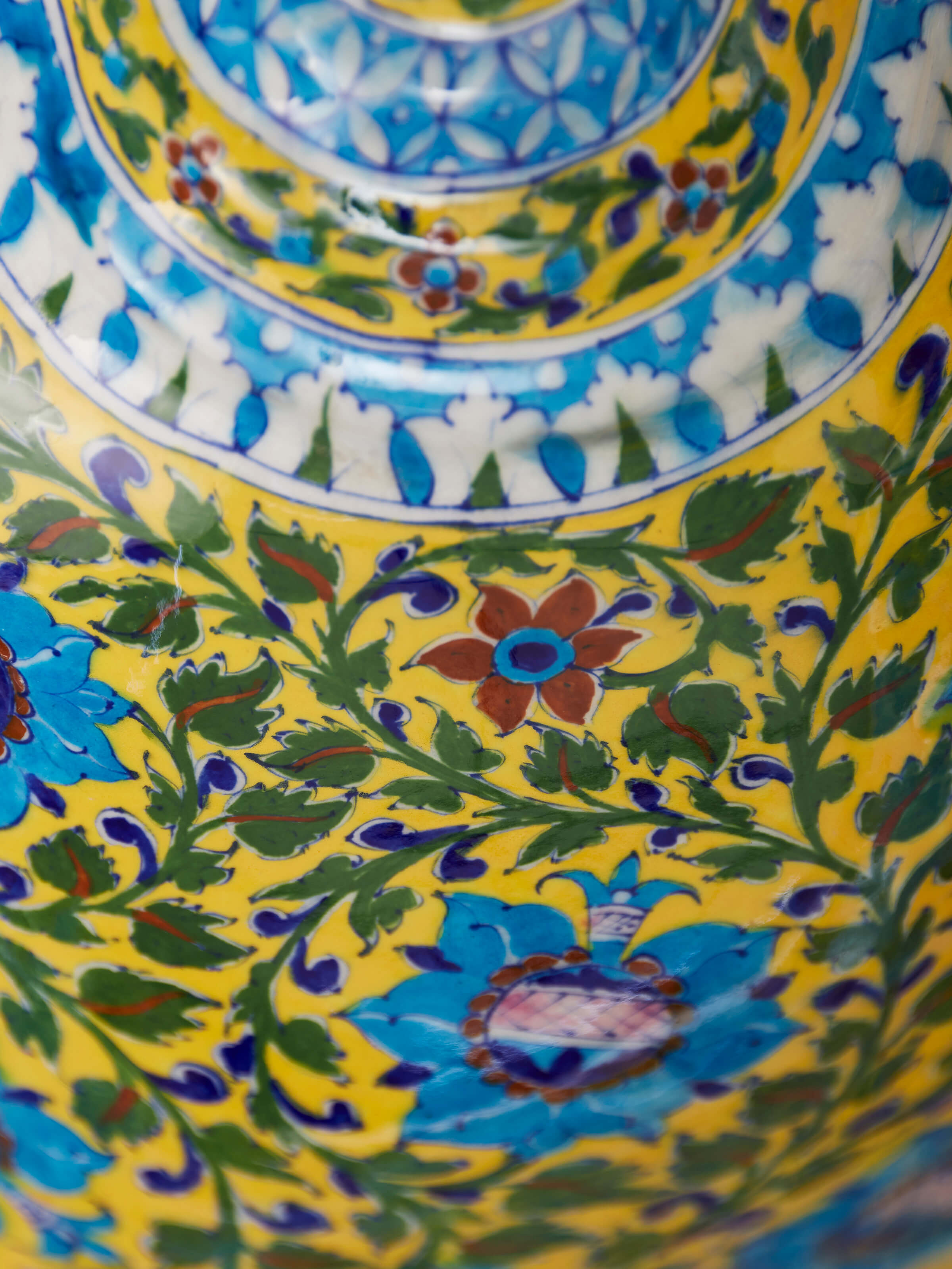 Close-up view of Blue pottery ceramic blossom shell artpiece multicolor