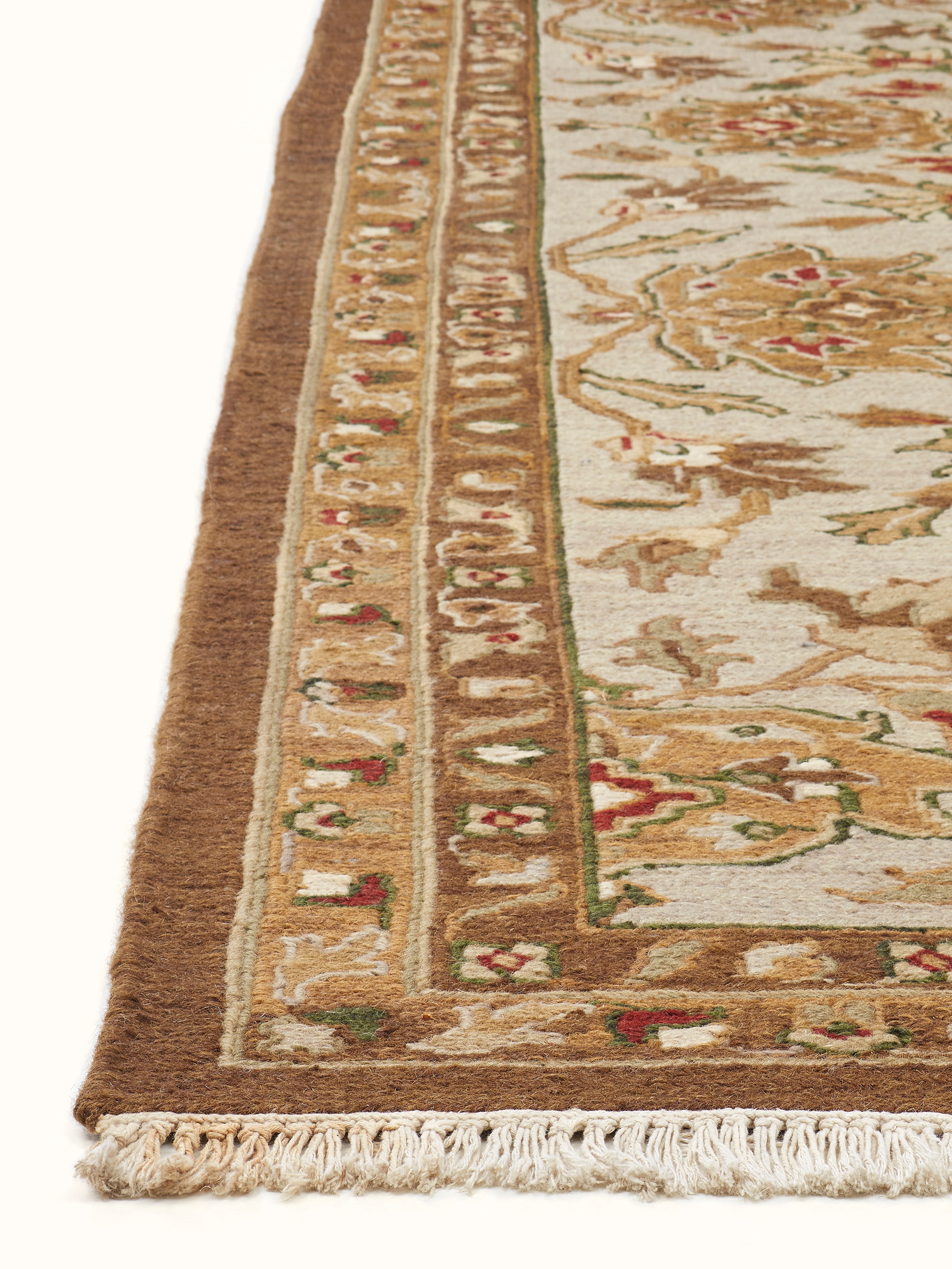 Close-up of Traditional Sumak brown chobi Bhadohi wool hand-knotted rug showing the detailed weaving and pattern.