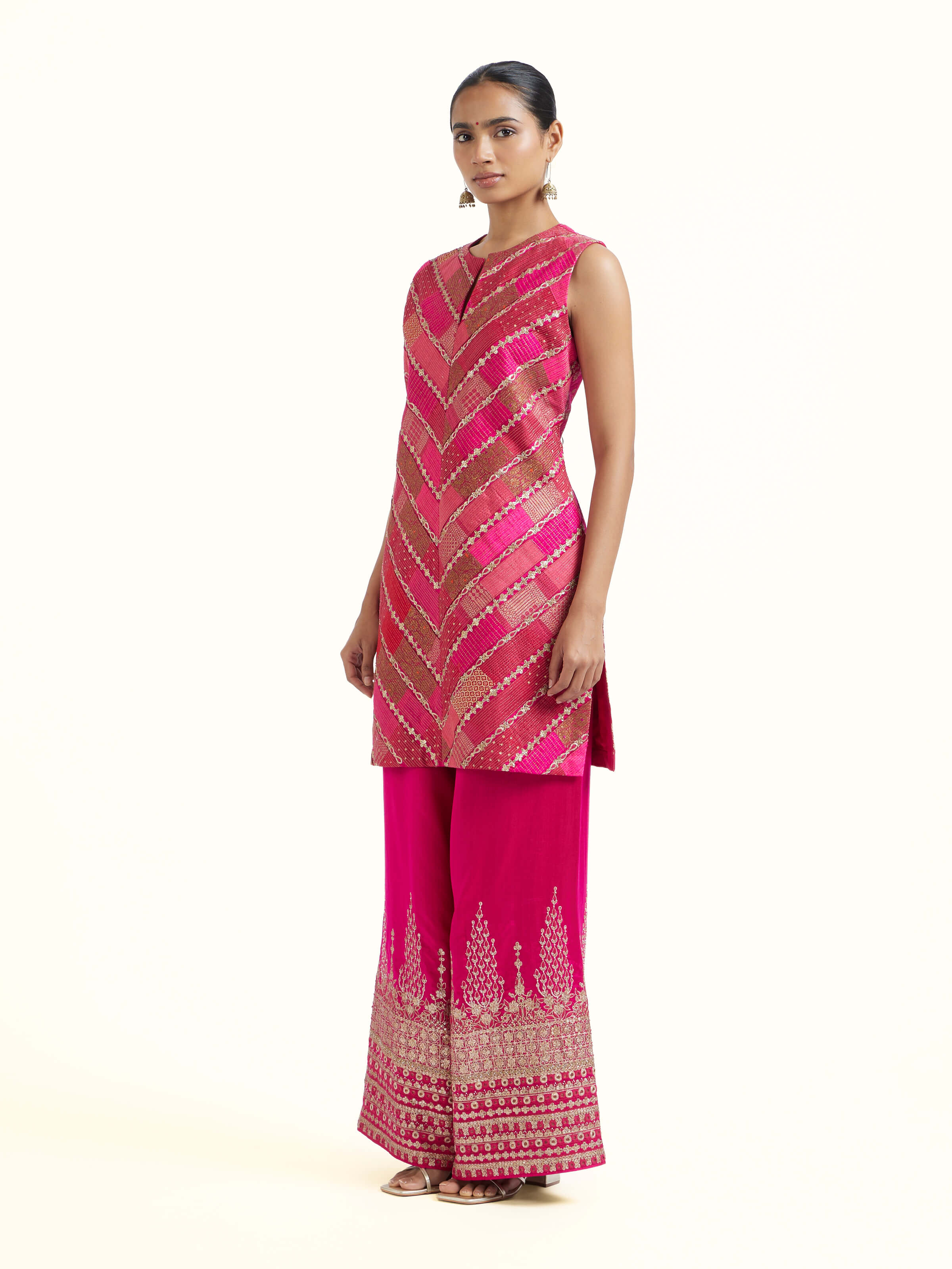 Side view of pink silk hand embroidery kurta set with elegant silhouette and fit