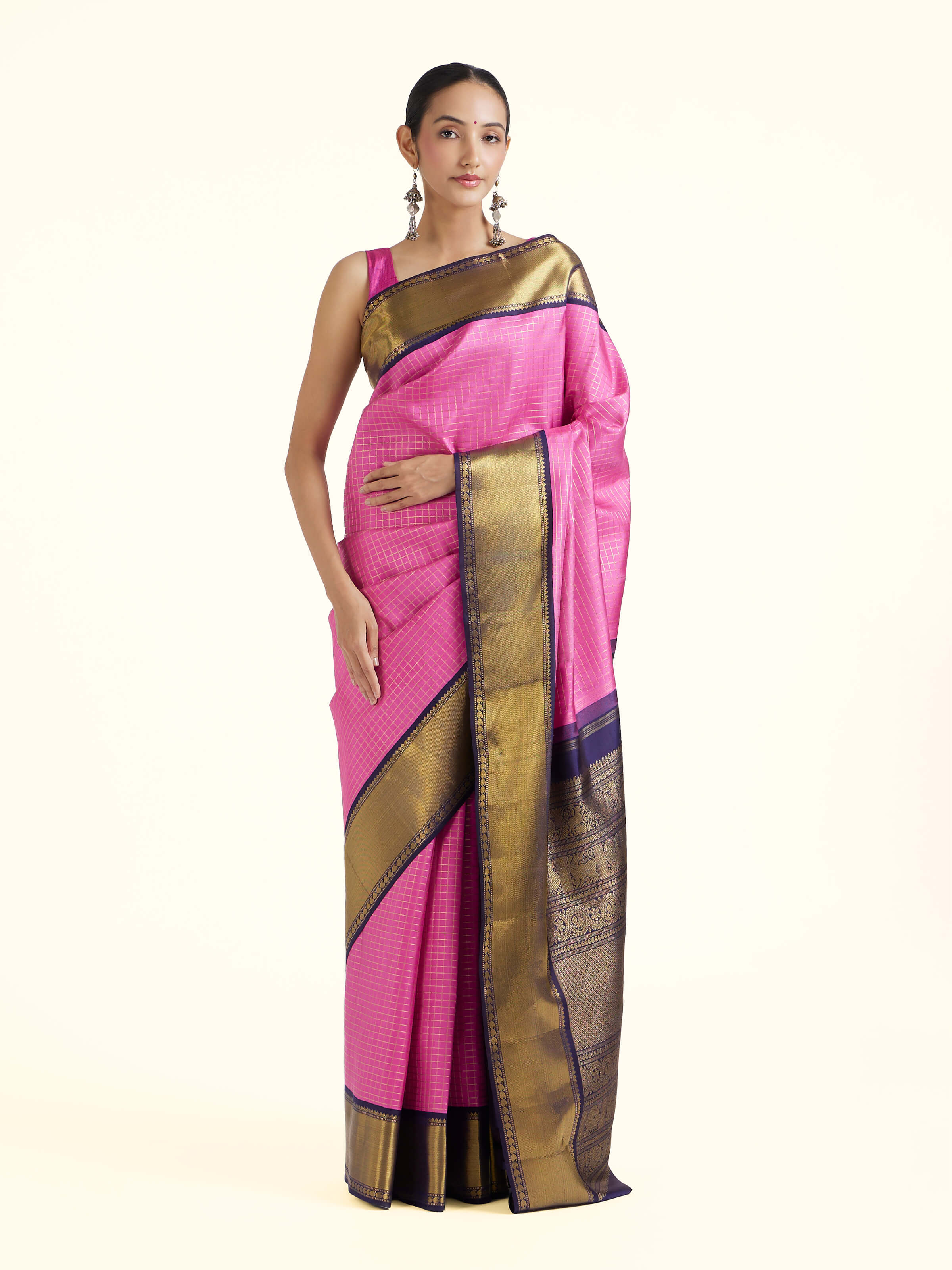 Front view of mauve silk Kancheepuram saree with rich zari woven motifs