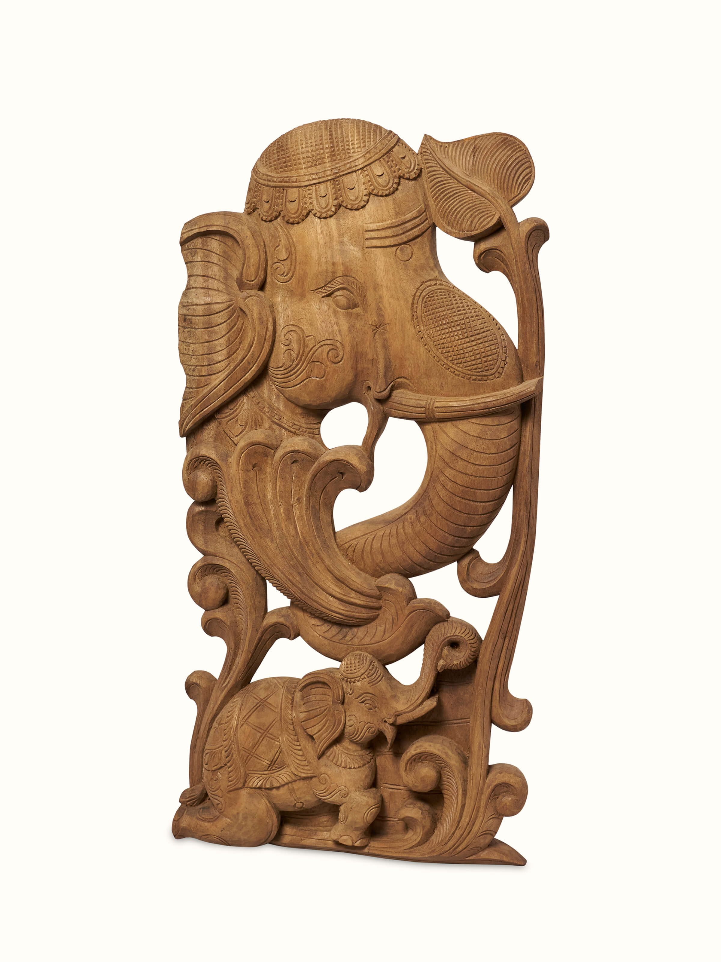Side view of Tenali Carved Neem Wood Elephant Face Brackets Sculpture (2Pcs) by Swadesh highlighting the detailed craftsmanship and natural wood finish.