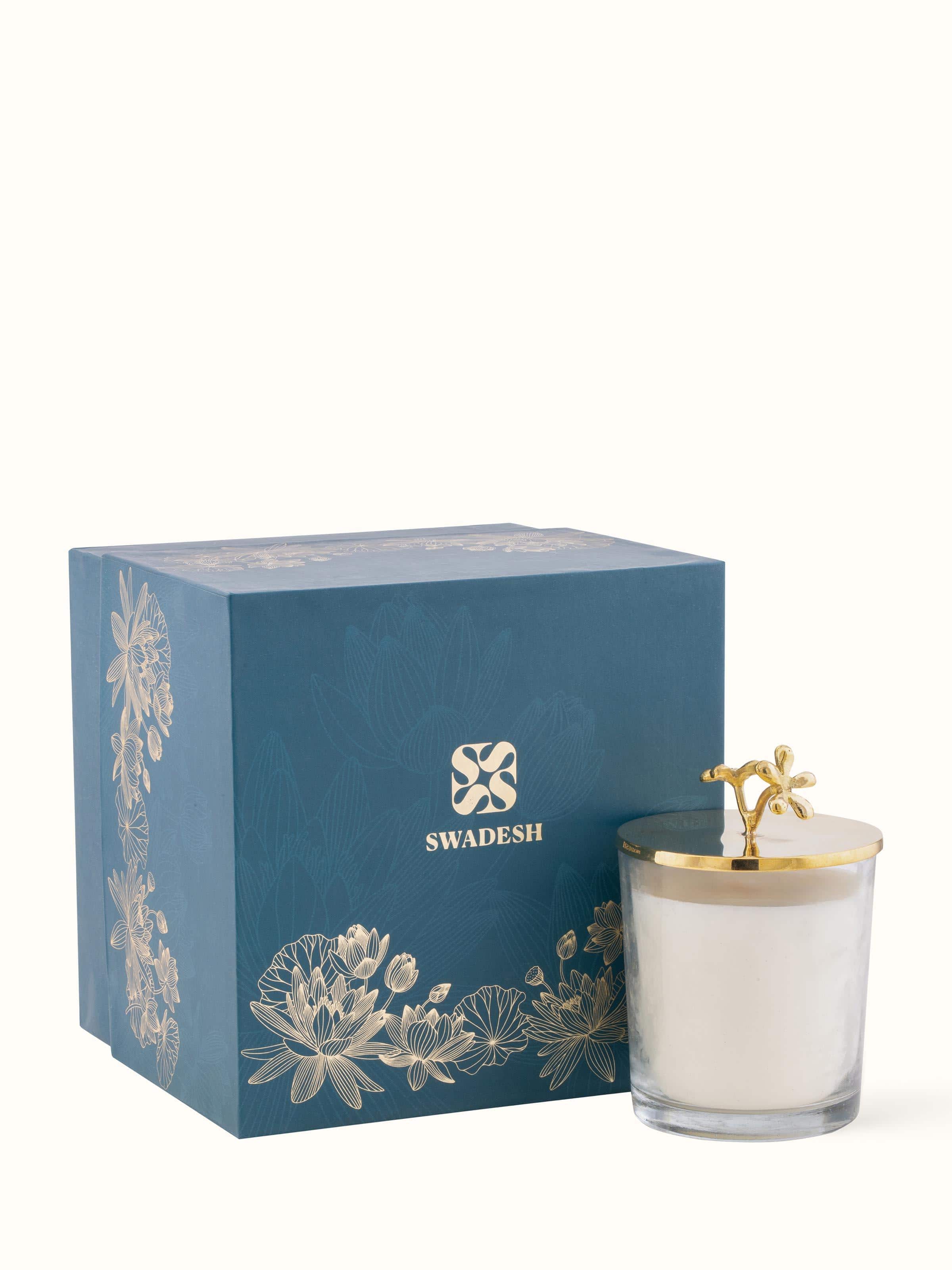 Brass Candle styled with decorative elements, adding to its luxurious appearance