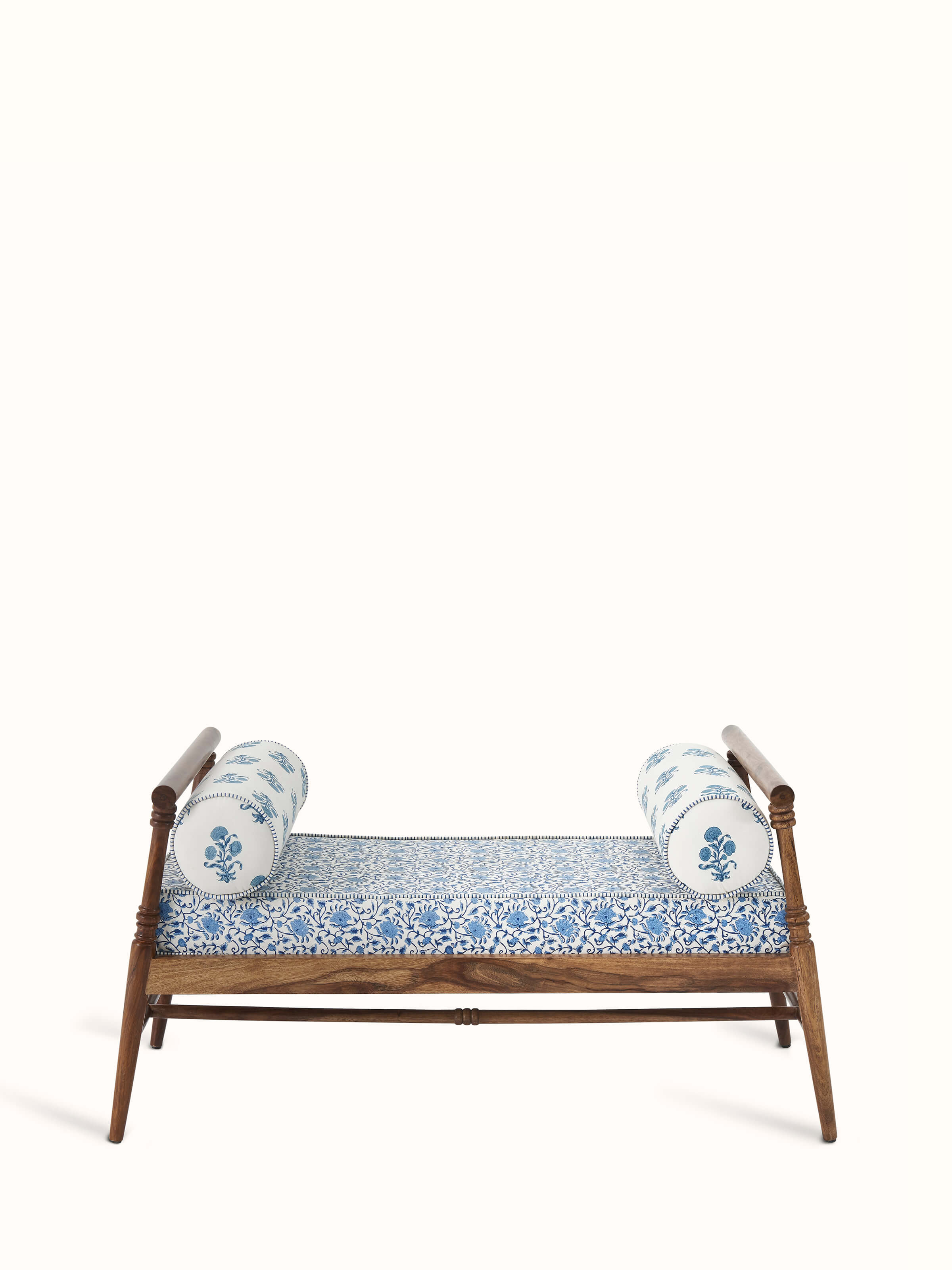 Front view of the Sheesham wood bench featuring Sanganeri block print and slanted legs