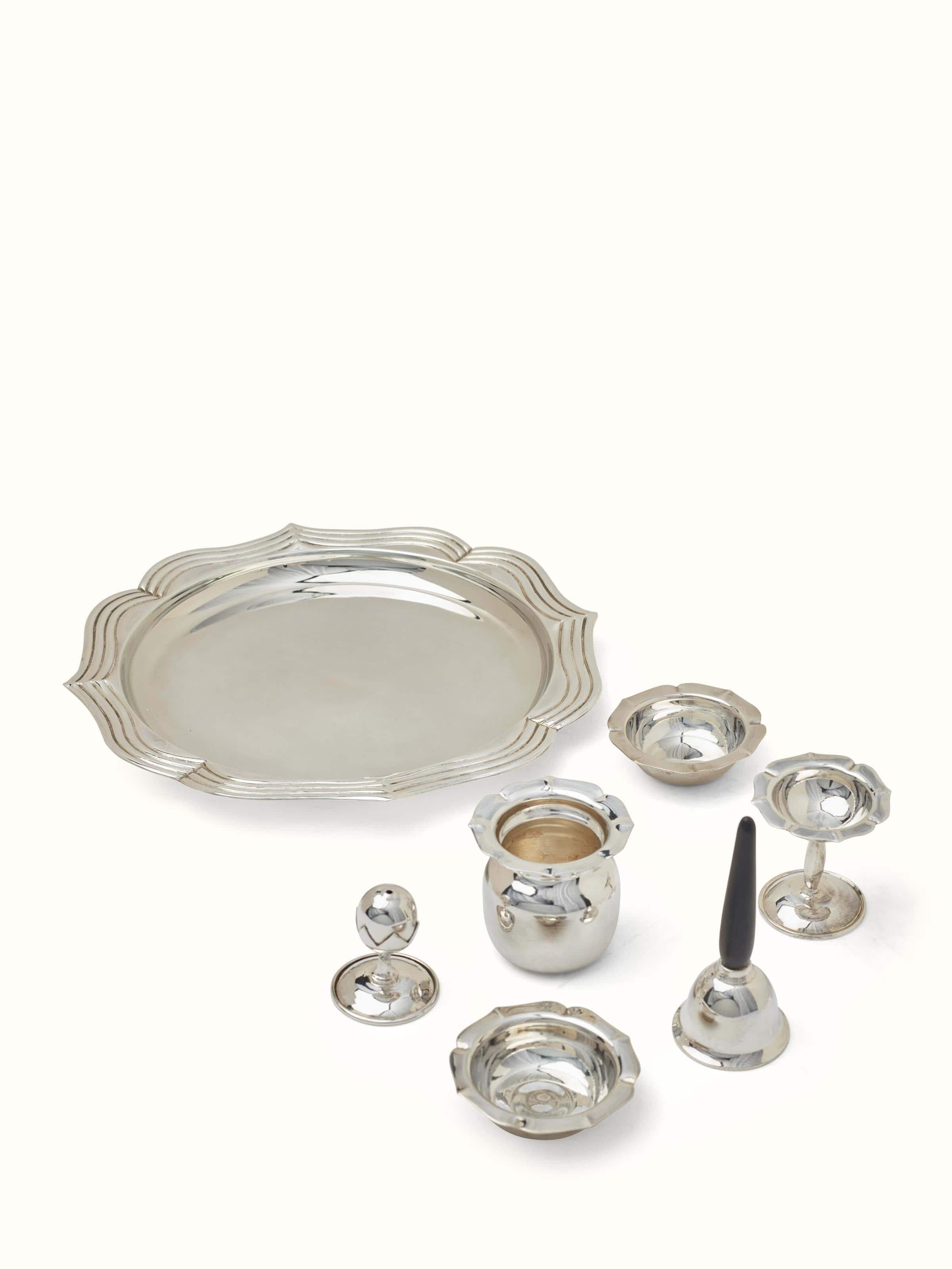 Top view of Chitai silver pooja thali set (7 pcs) with detailed patterns