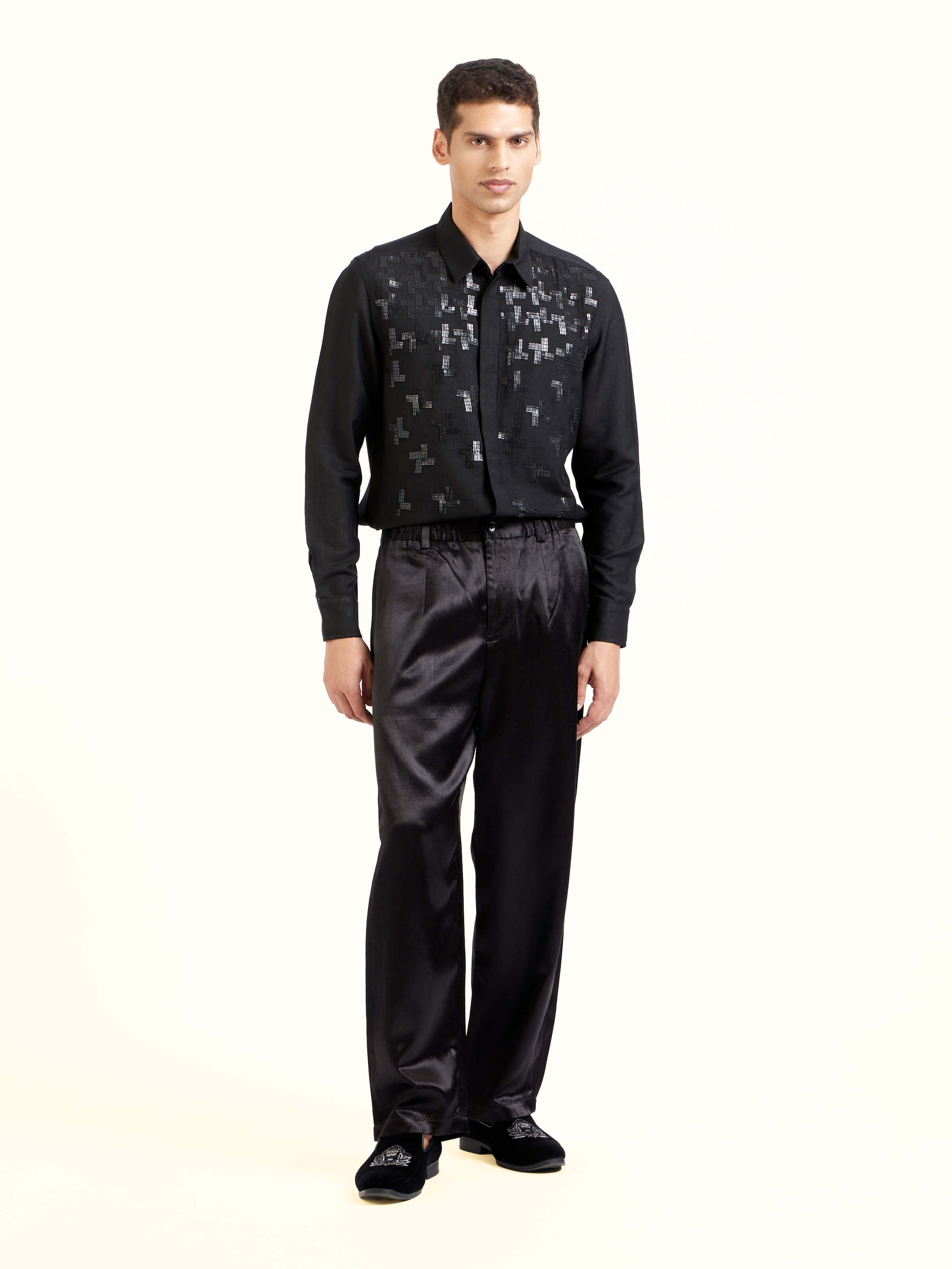 Front view of black straight cut mashru pants showcasing clean tailored fit