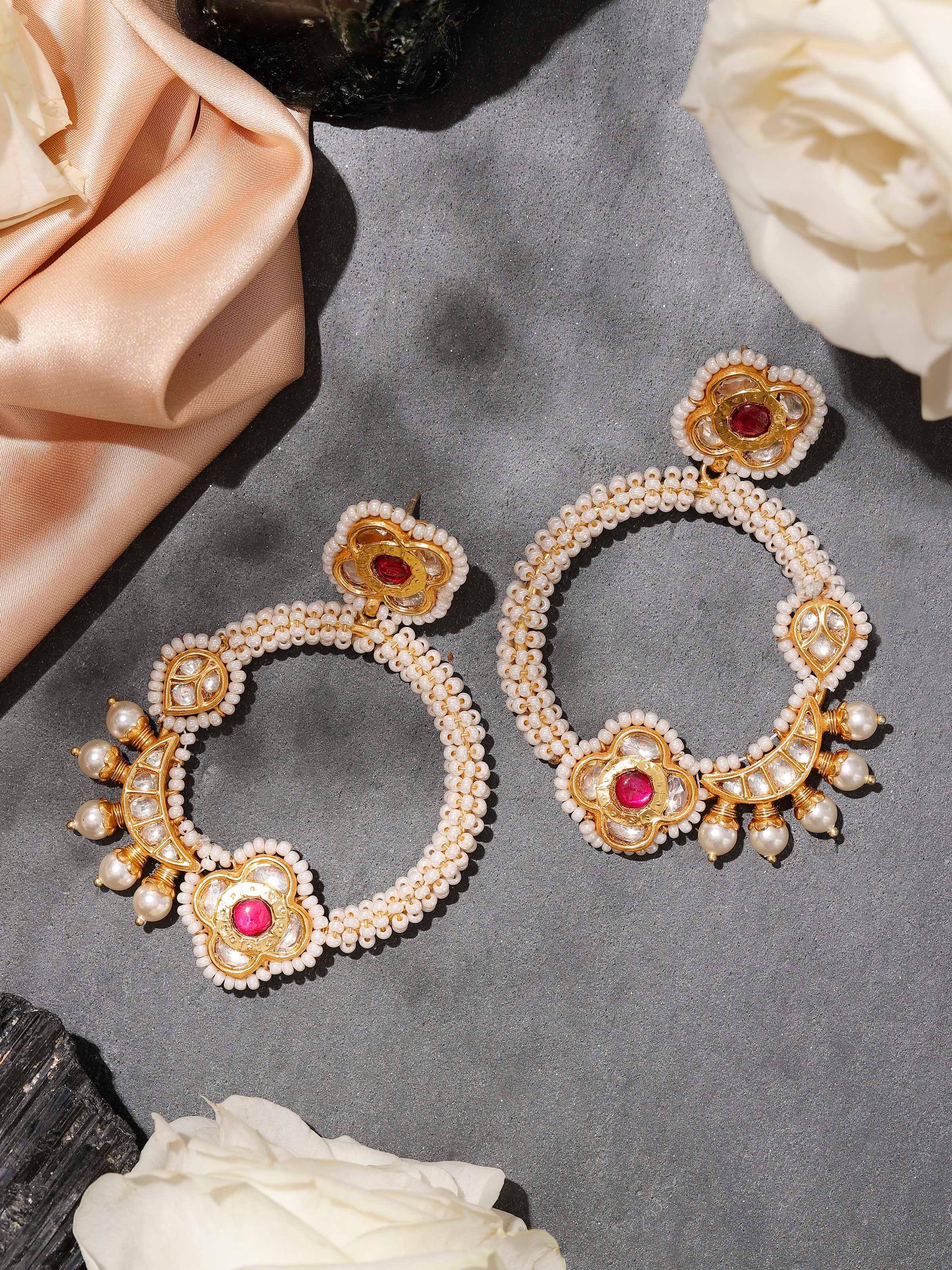 Lifestyle view of Silver Smithing chandbalis styled with ethnic attire, highlighting intricate silver craftsmanship.