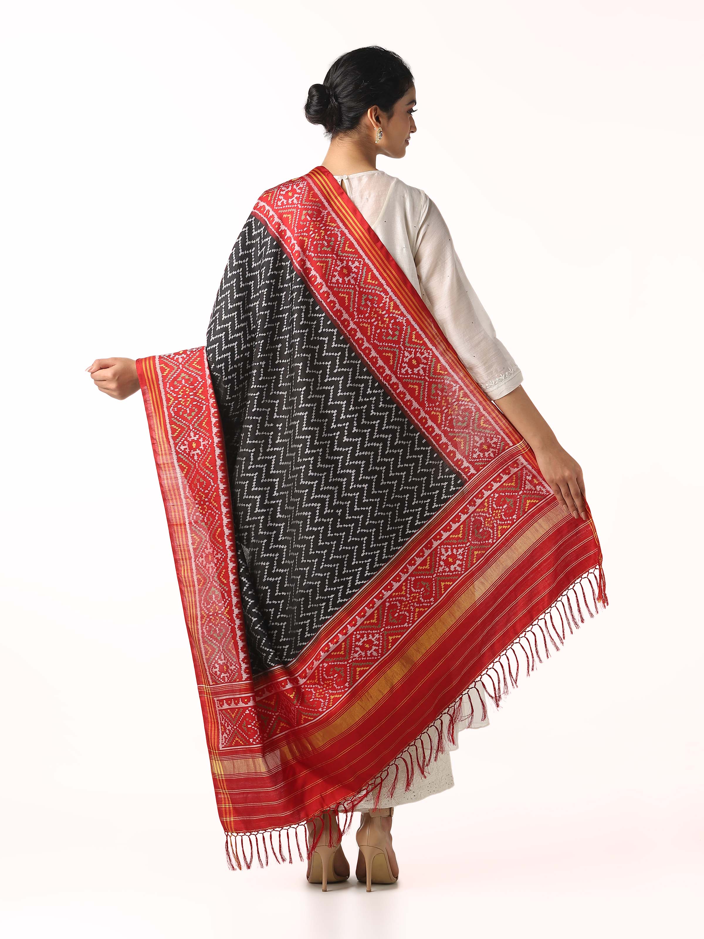 Back view of black silk Patola dupatta showing complete pattern and border