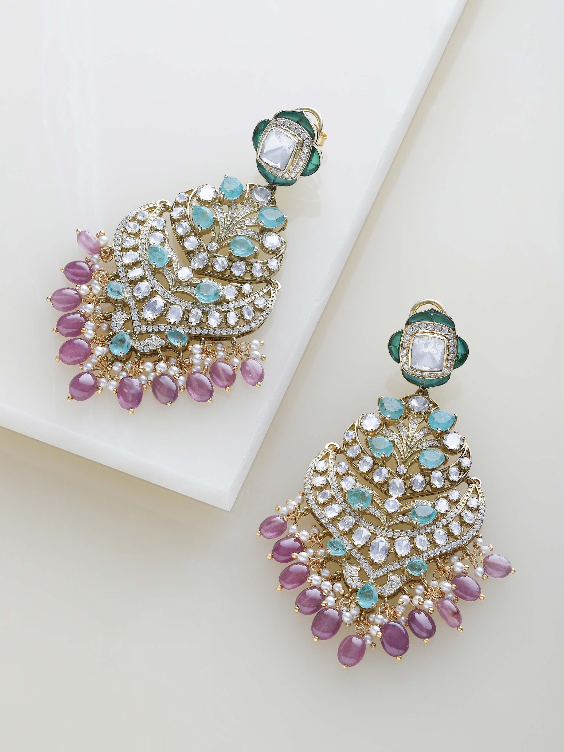 Silver smithing chandelier earrings worn on ears – Swadesh