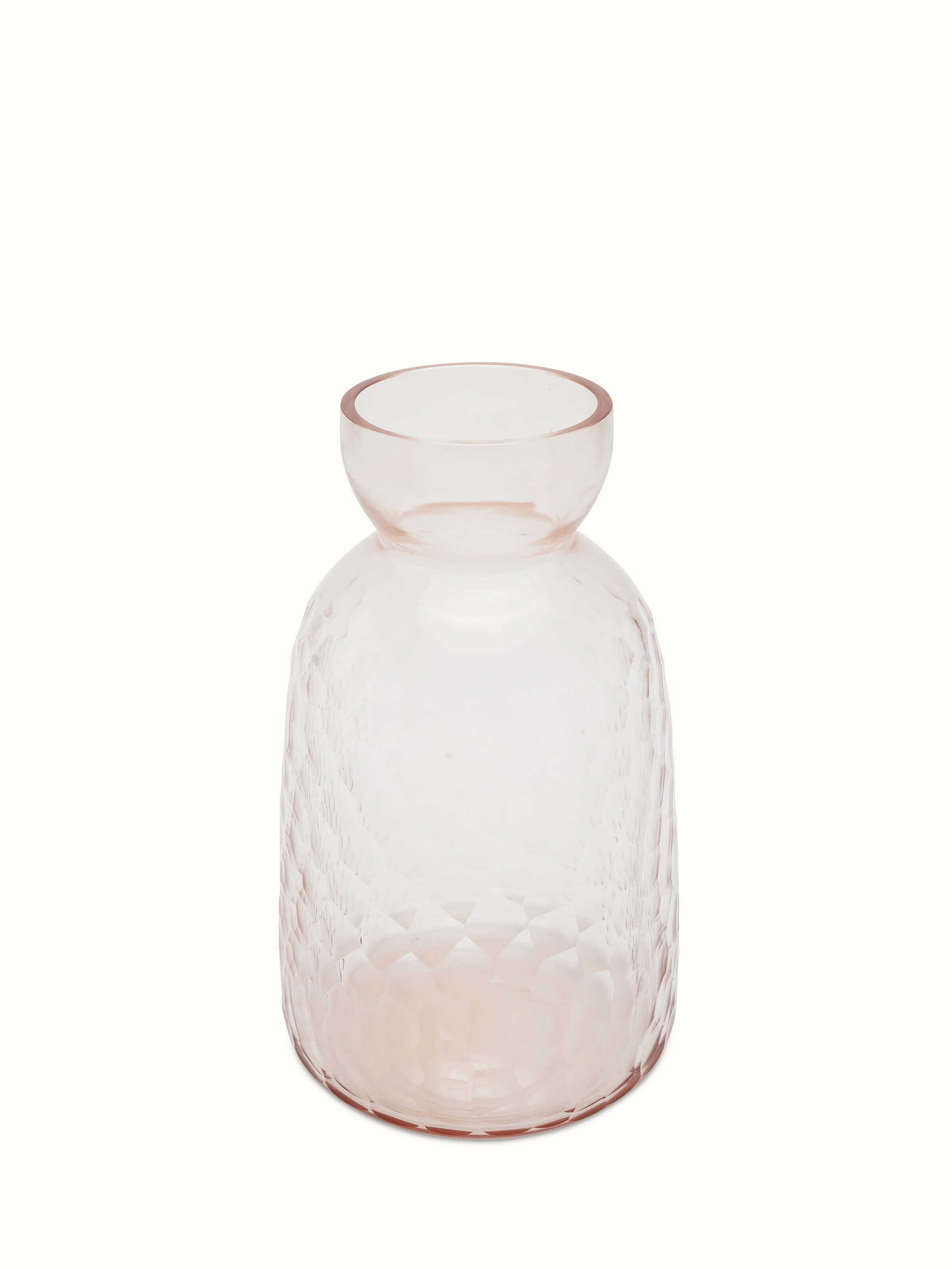 Side view of glass table vase in peach color, highlighting the smooth finish and design.