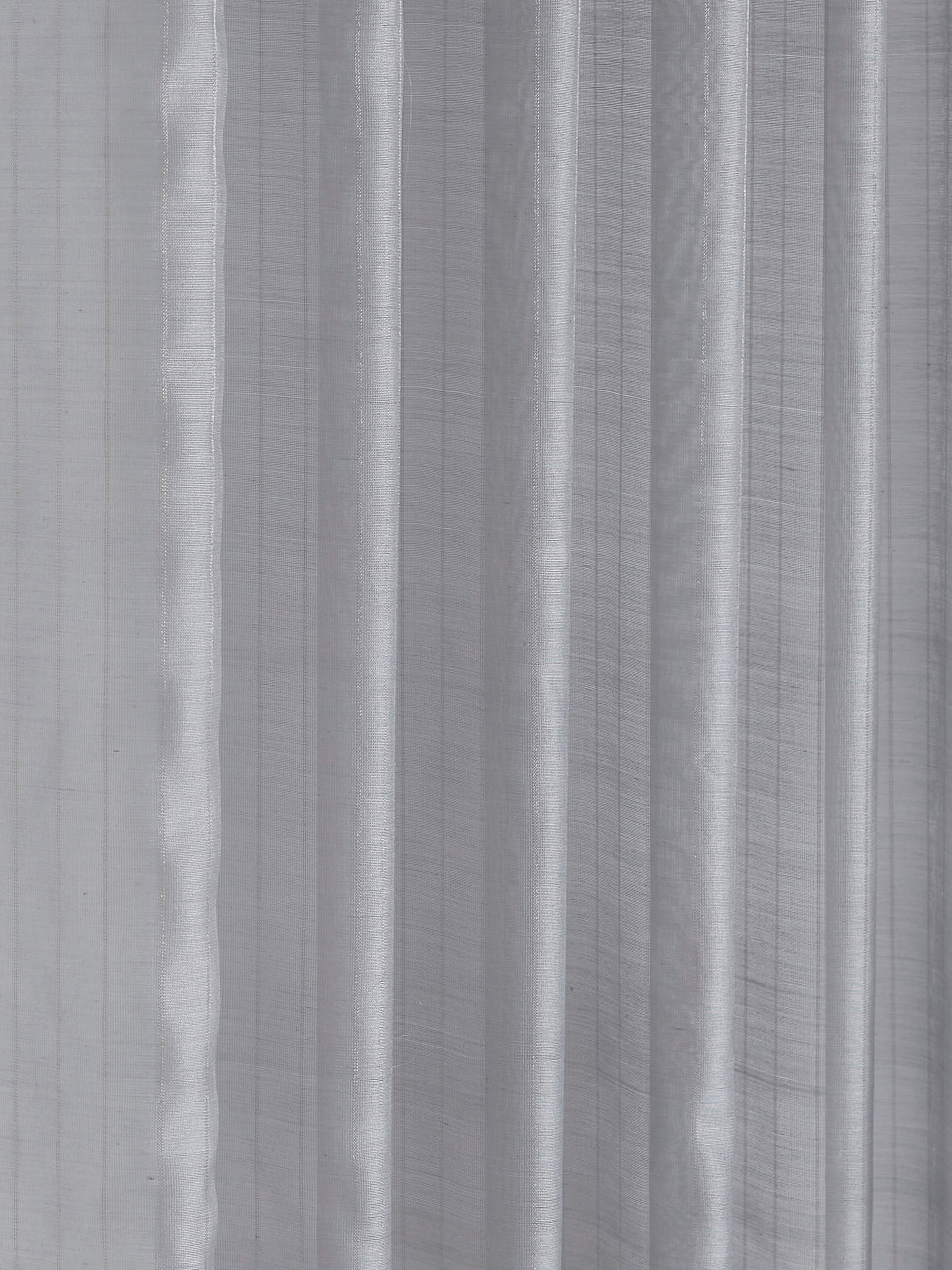 Close-up shot showing delicate handwoven stripes and fabric finish.