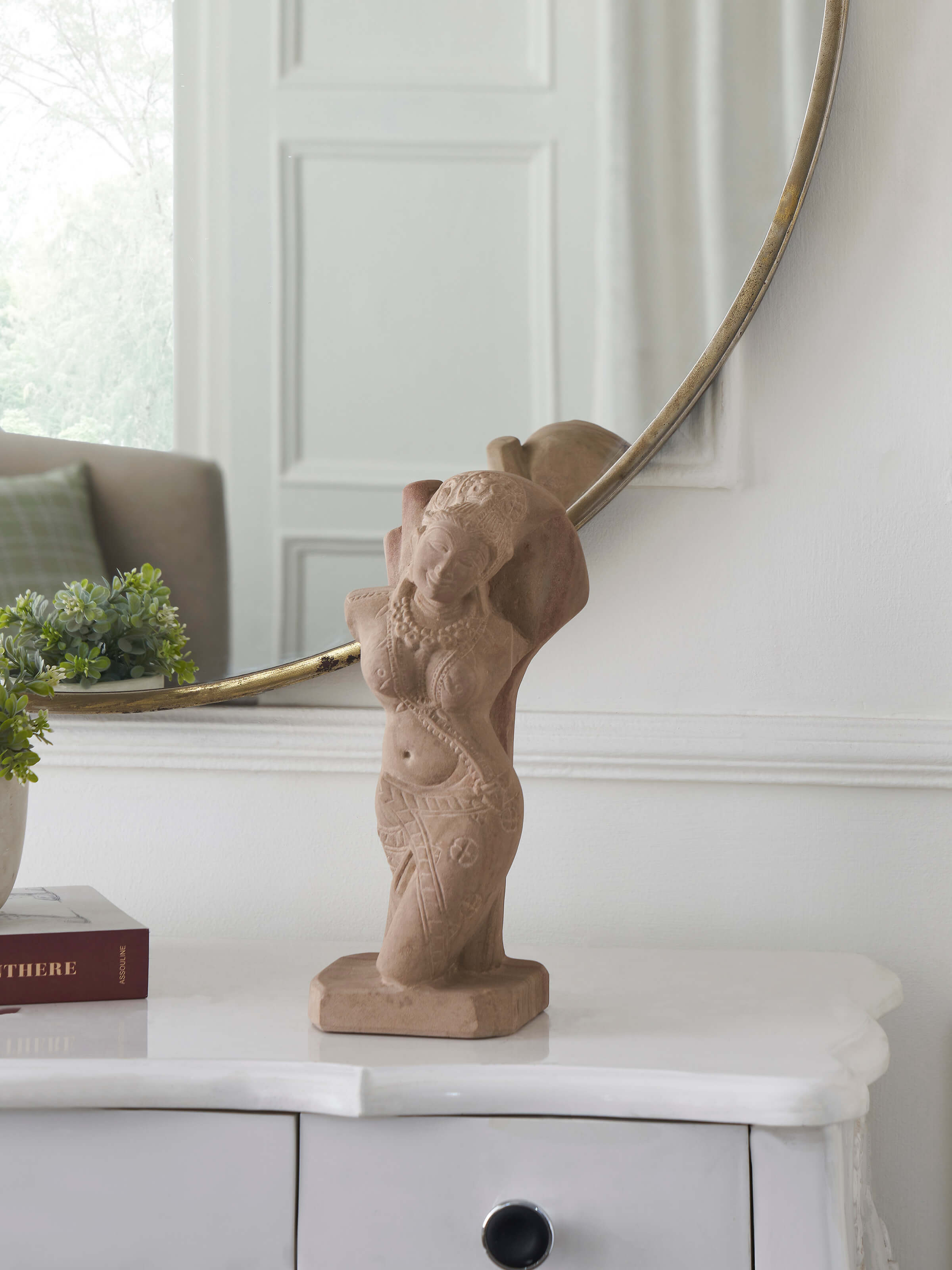 Side view of Enchanting Carved Stone Shalabhanjika Sculpture highlighting the intricate carving details.