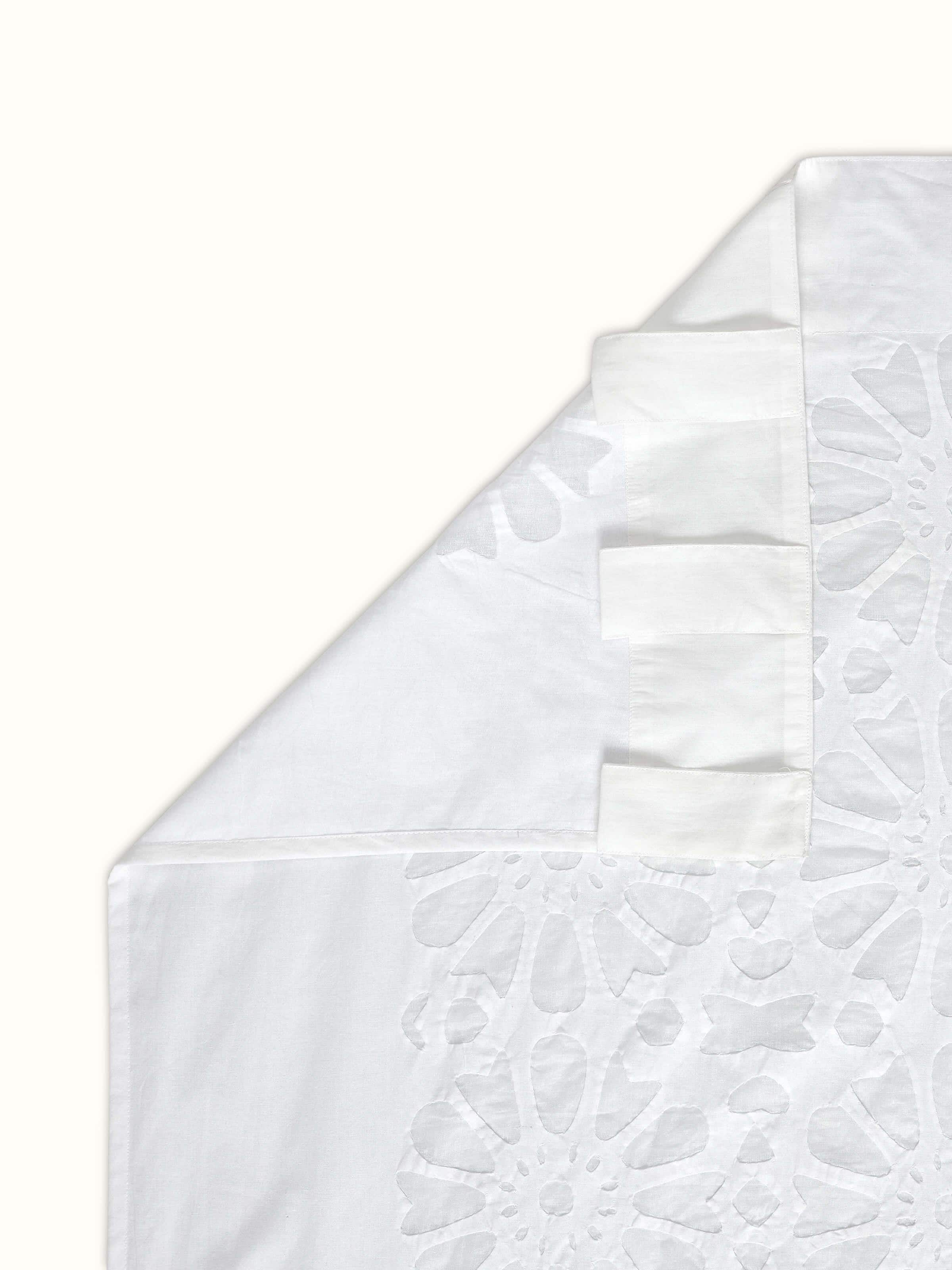 Back view of Mandana cotton sheer curtain with finished hem and translucent appeal