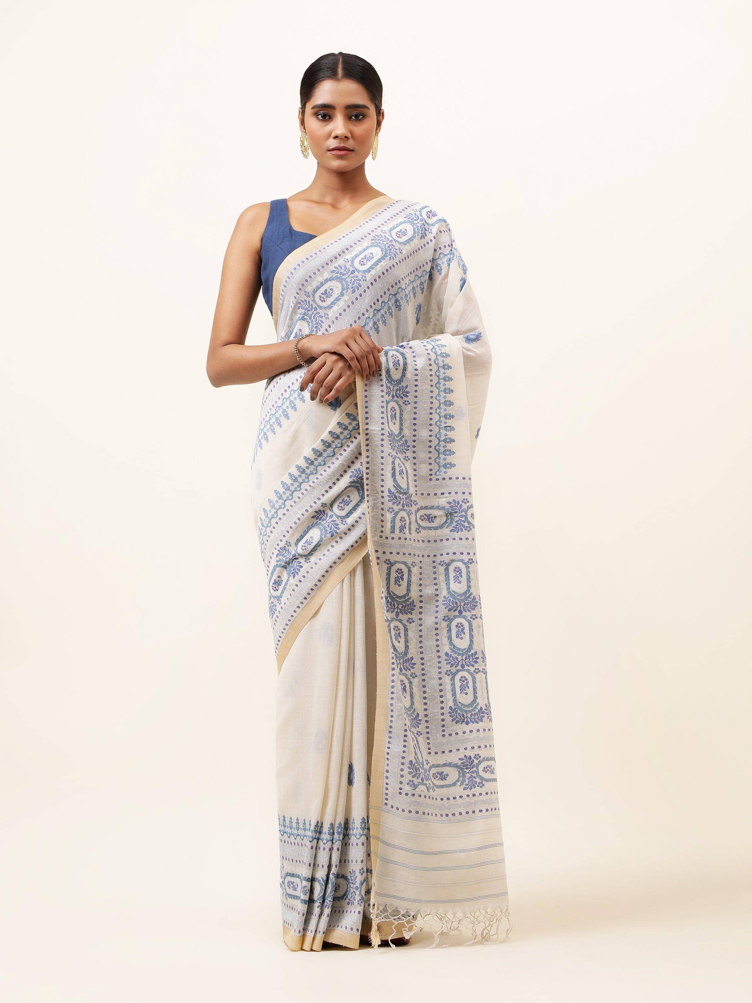 Front view of off-white cotton Jamdani saree showcasing intricate handwoven patterns