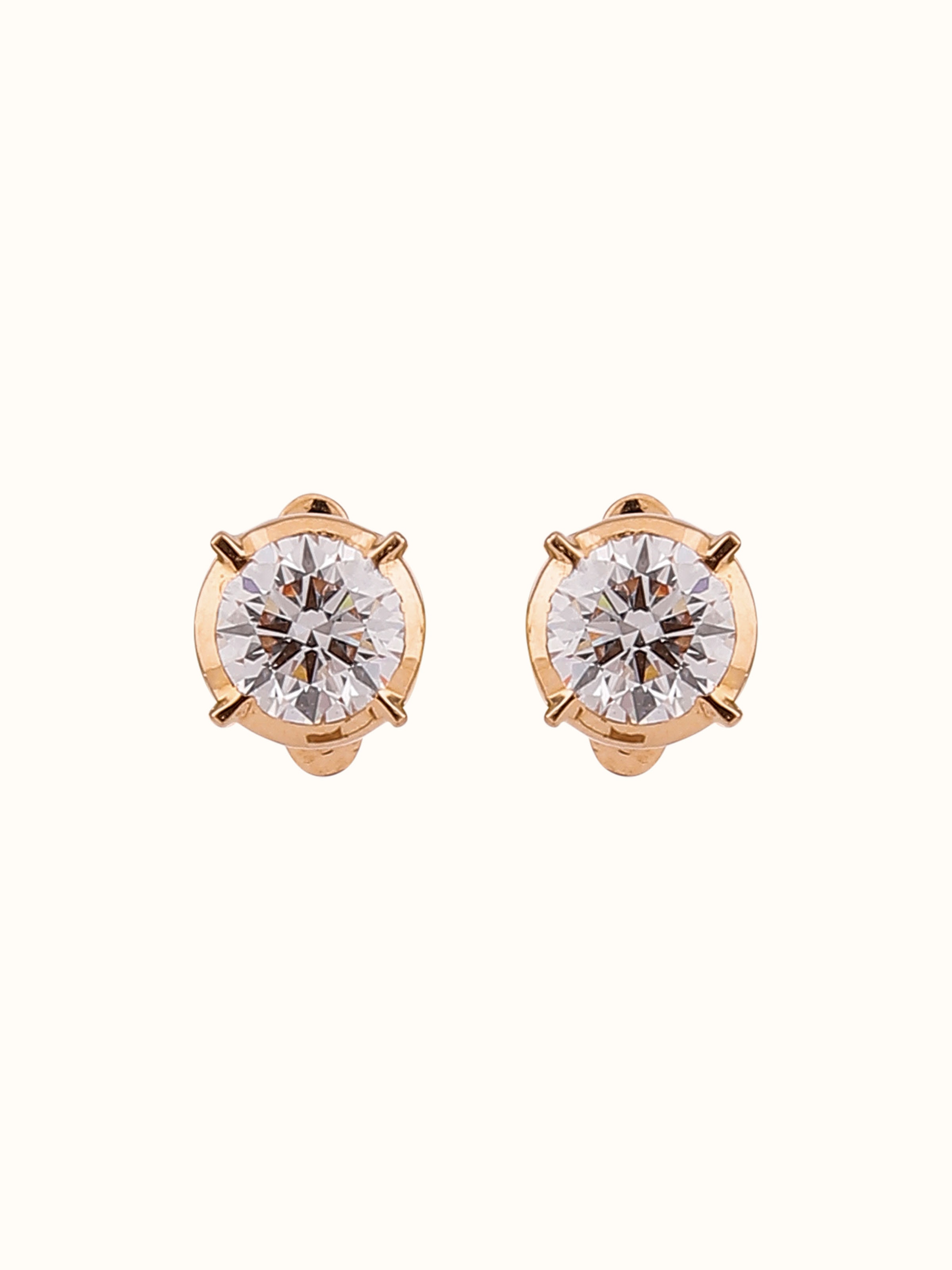 Front view of Close-setting 22 Karat Gold Studs featuring circular design and lustrous yellow gold.