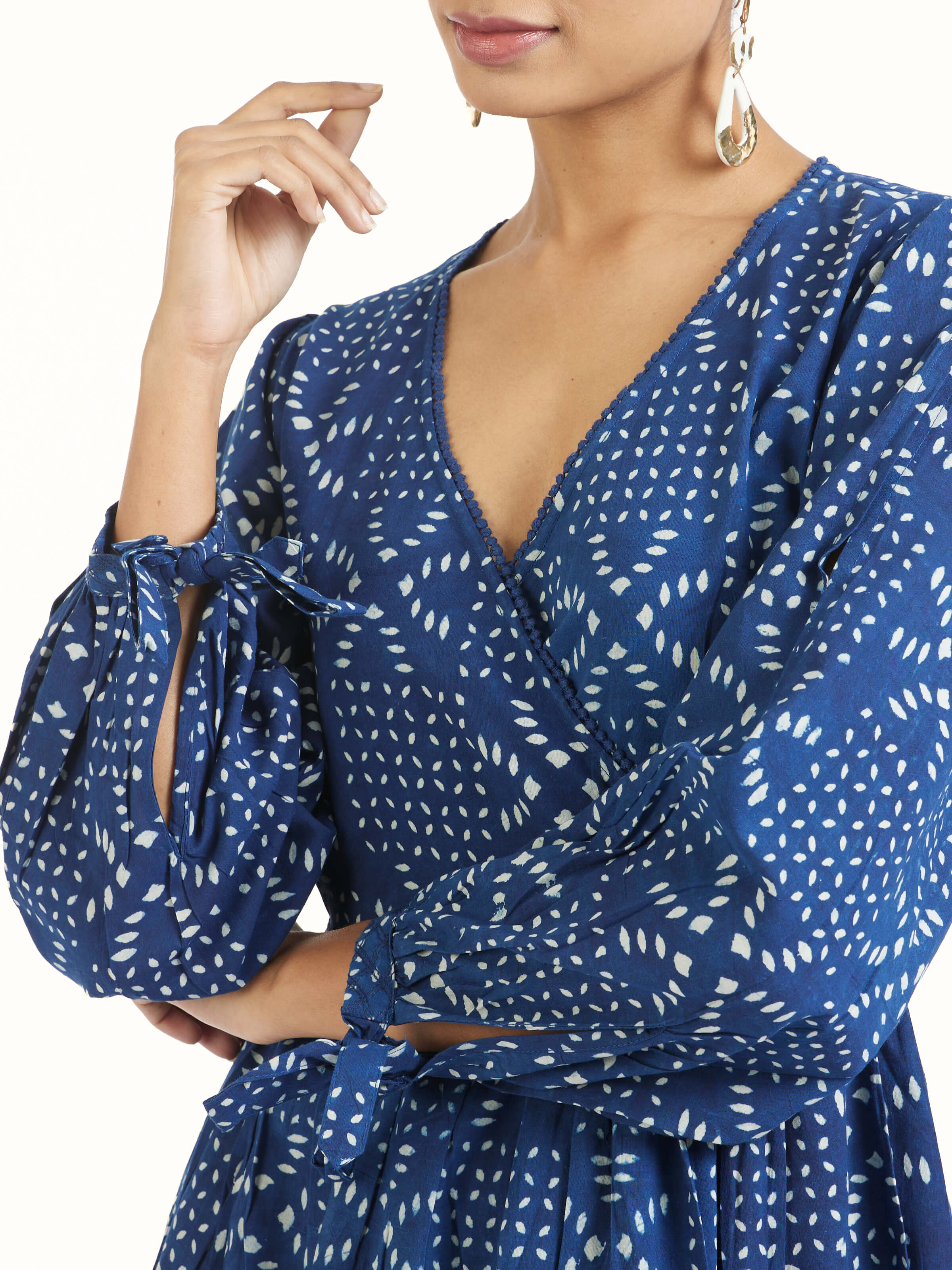 Detail view of Samika cotton dabu block printed dress showing fabric texture and print detail