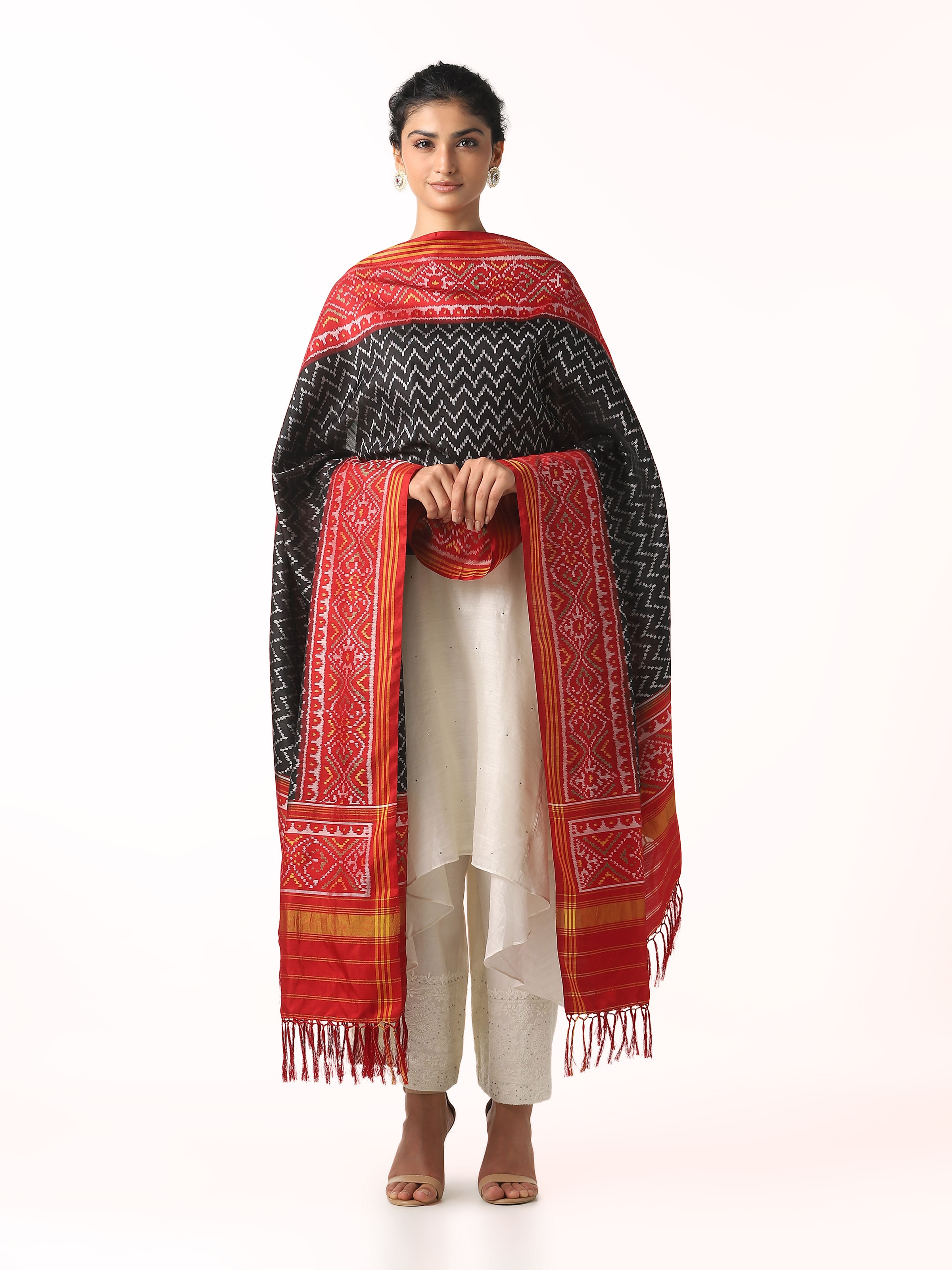 Front view of black silk Patola dupatta with traditional geometric patterns