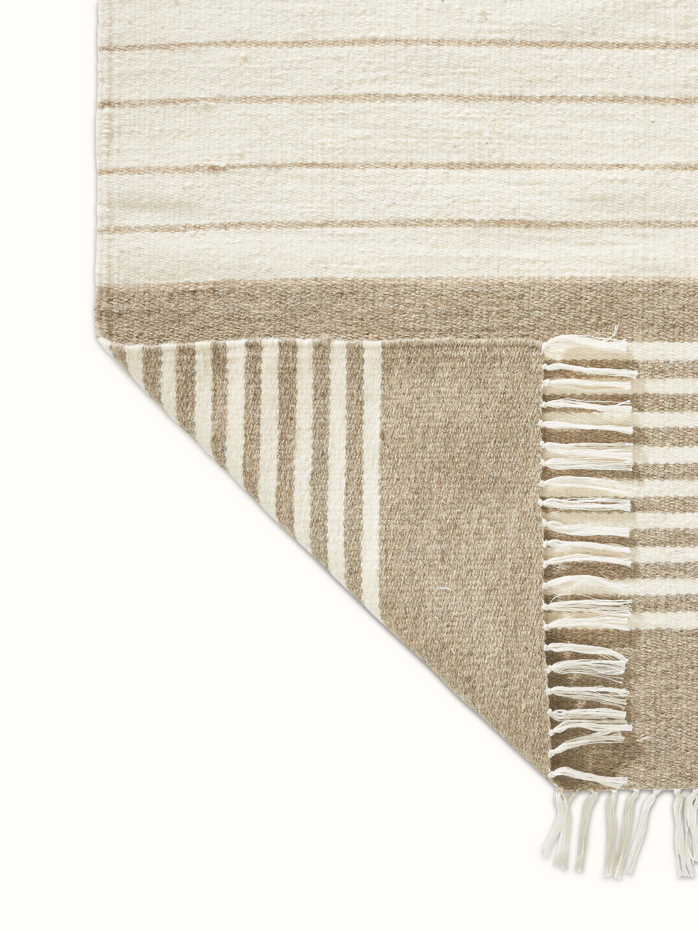 Close-up of Nomad Stripes Beige Ivory Jawaja wool & cotton handloom dhurrie (3x5 ft), focusing on the striped design and fabric quality.