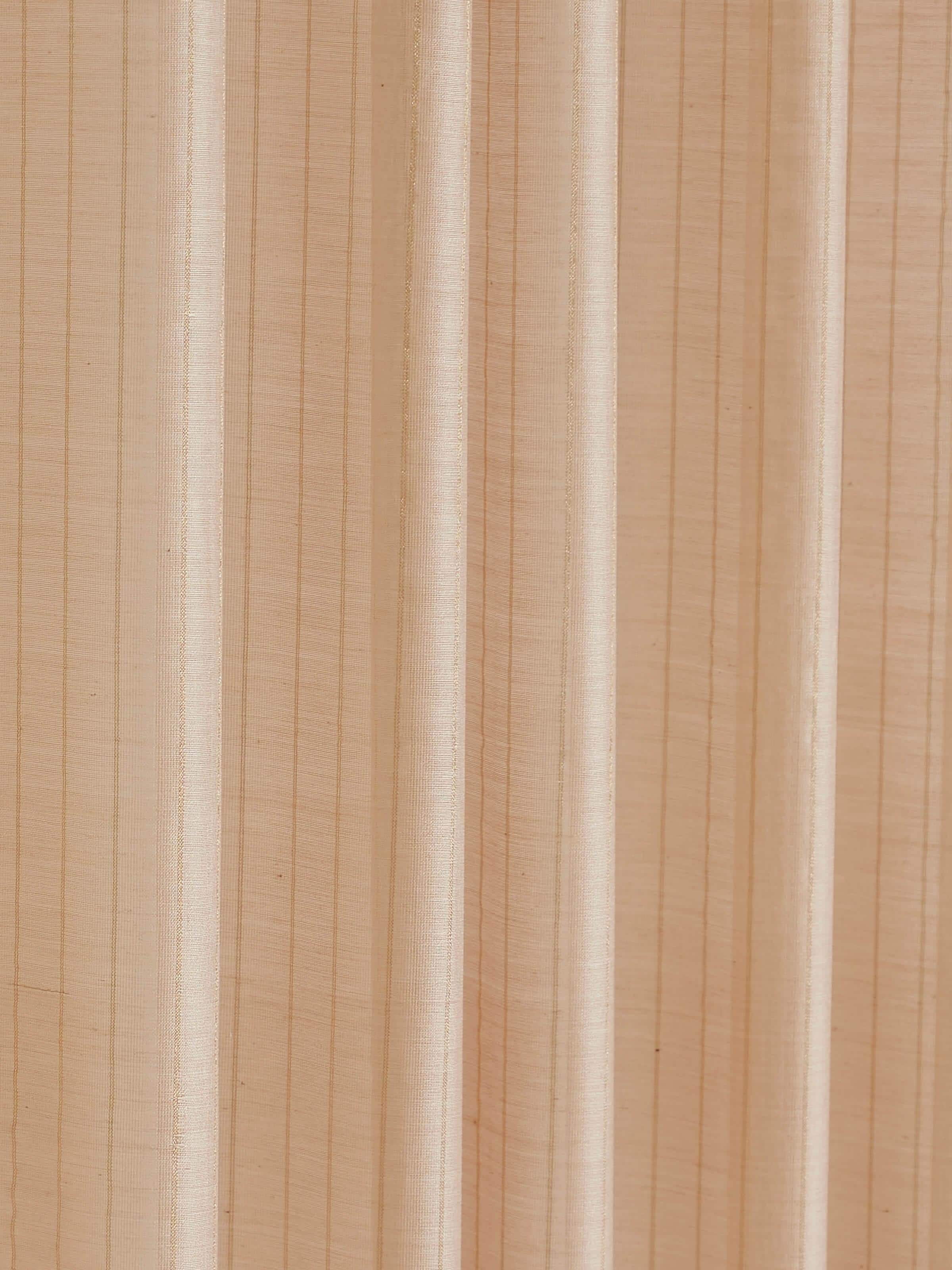 Detail shot highlighting metallic thread stripes on Maheshwari handloom sheer curtain.