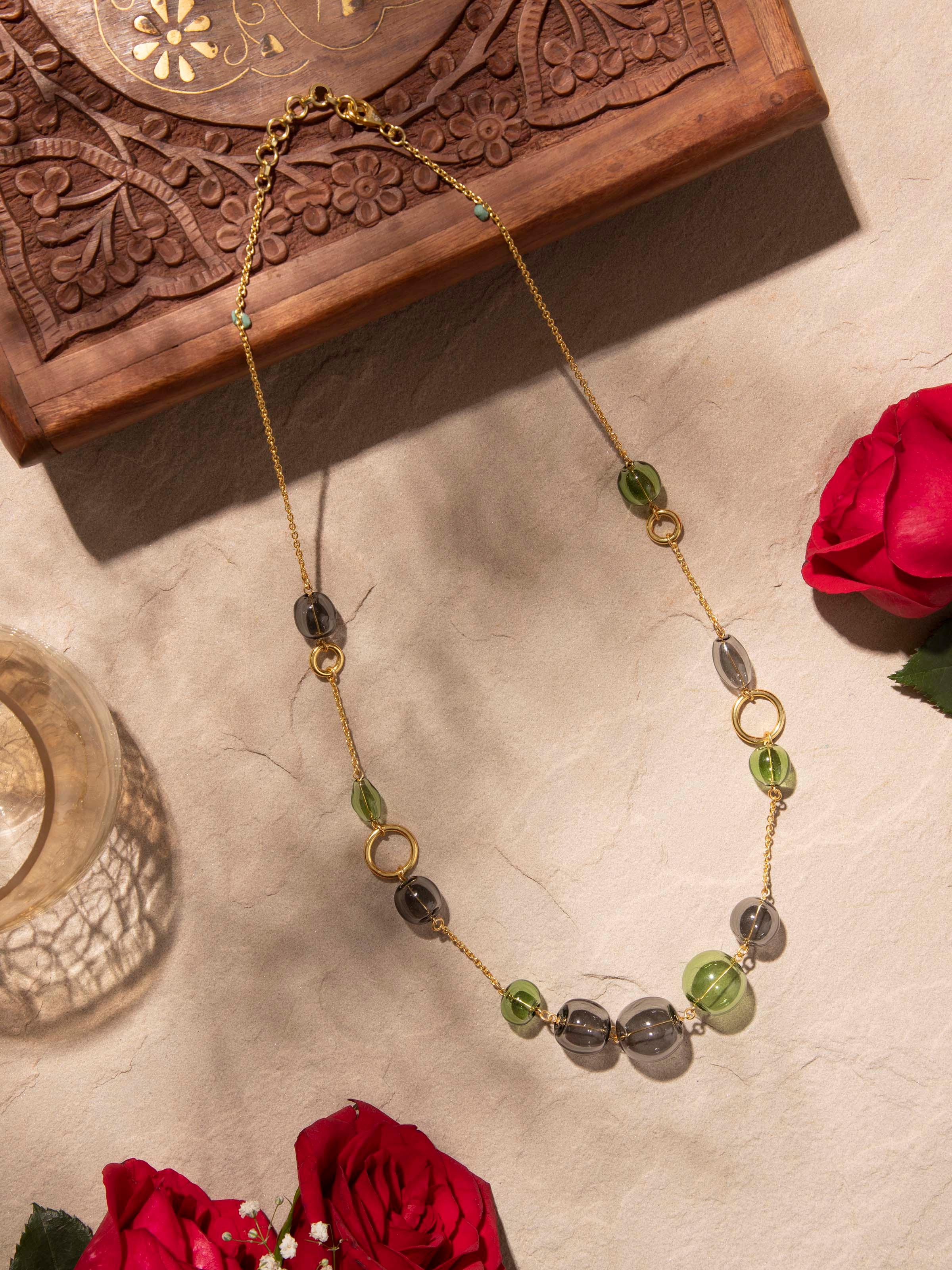 Close-up of Glass Flamework Silver Long Necklace highlighting the intricate glasswork and silver accents.