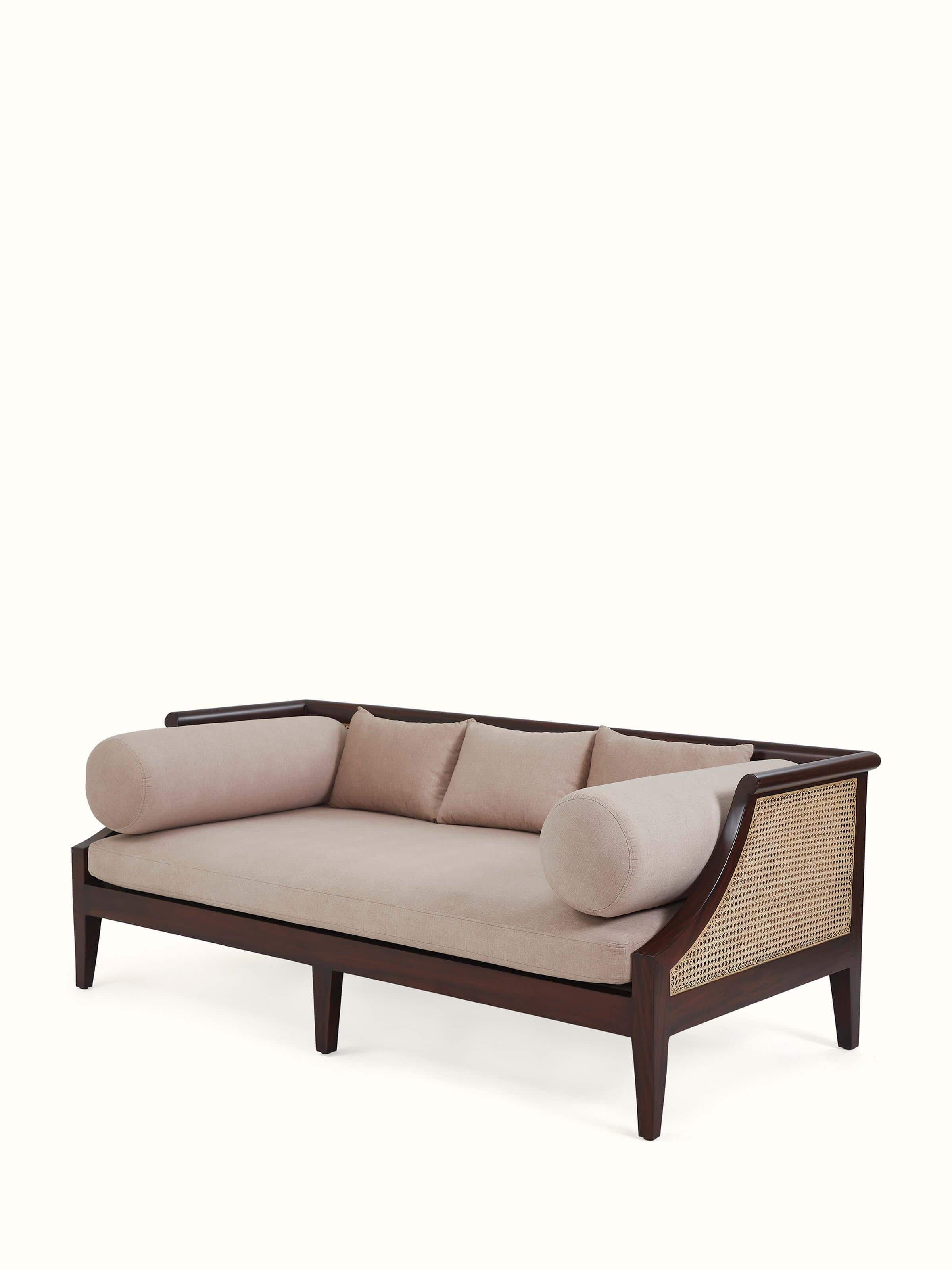 Angled view of Upholstered Mahogany Wood 3-Seater Sofa highlighting its sleek lines and comfortable design.