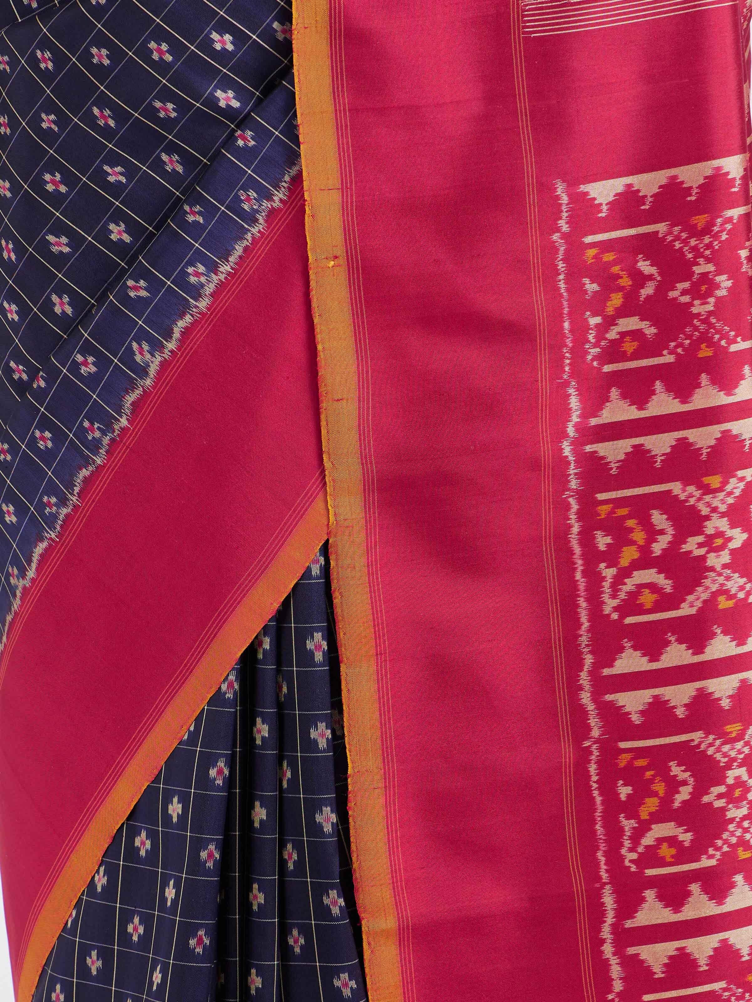 Detail view of navy mulberry silk Ikat saree showcasing fine silk texture