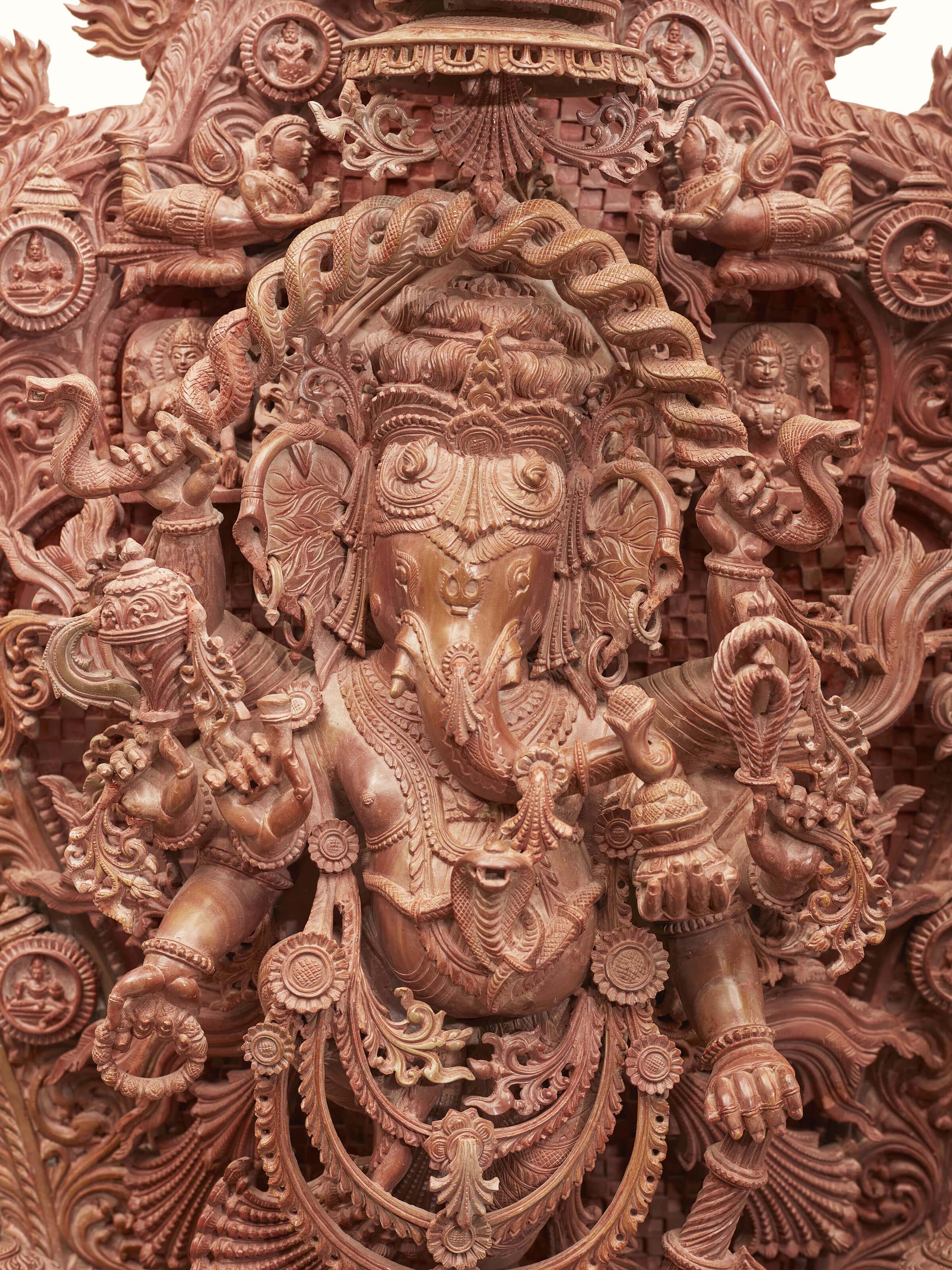 Angled view of Stone Ganesha Idol revealing the overall artistry and detailed carving