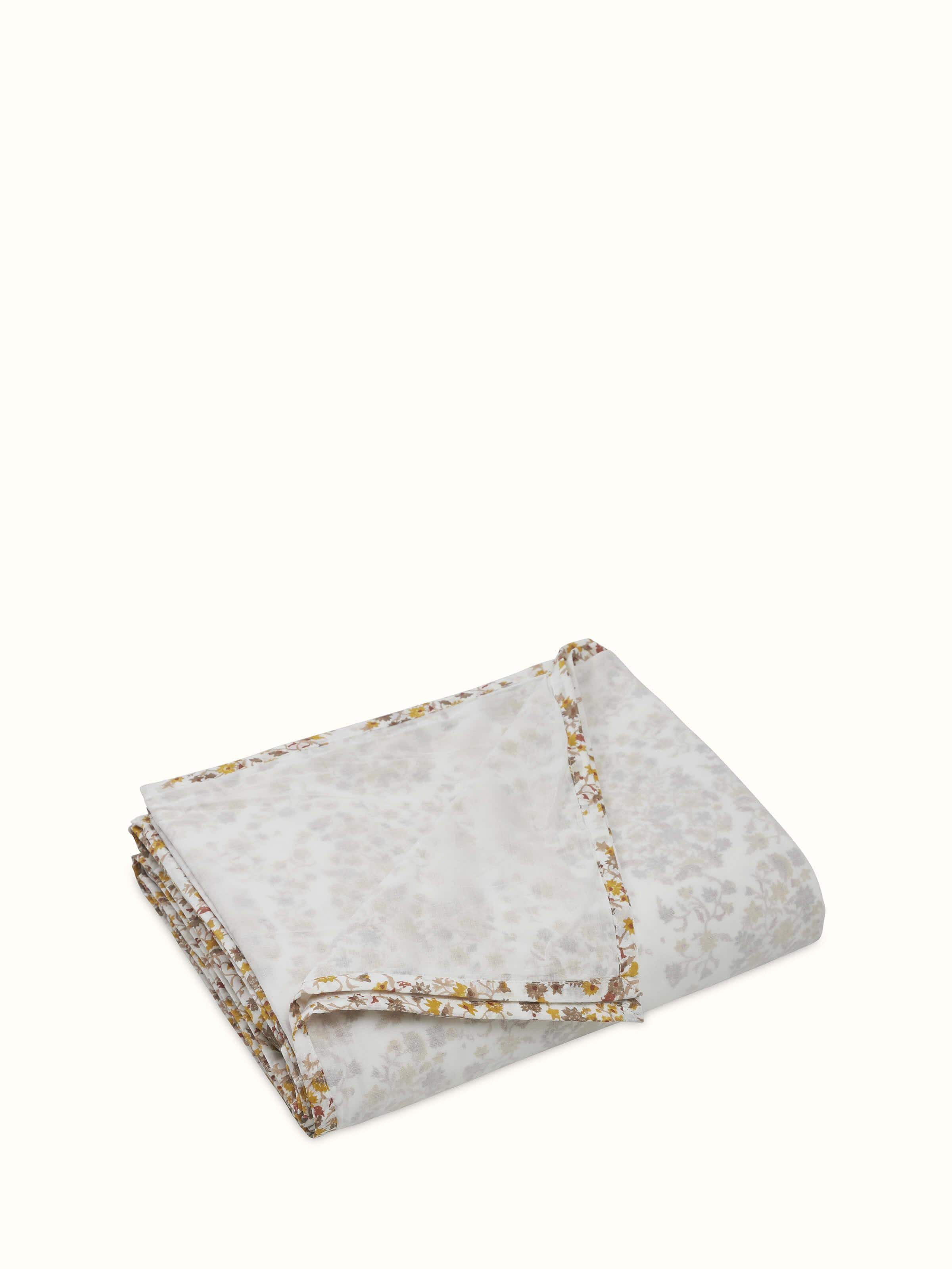 Angled view highlighting red paisley motifs and soft cotton texture of Sanganeri single dohar.